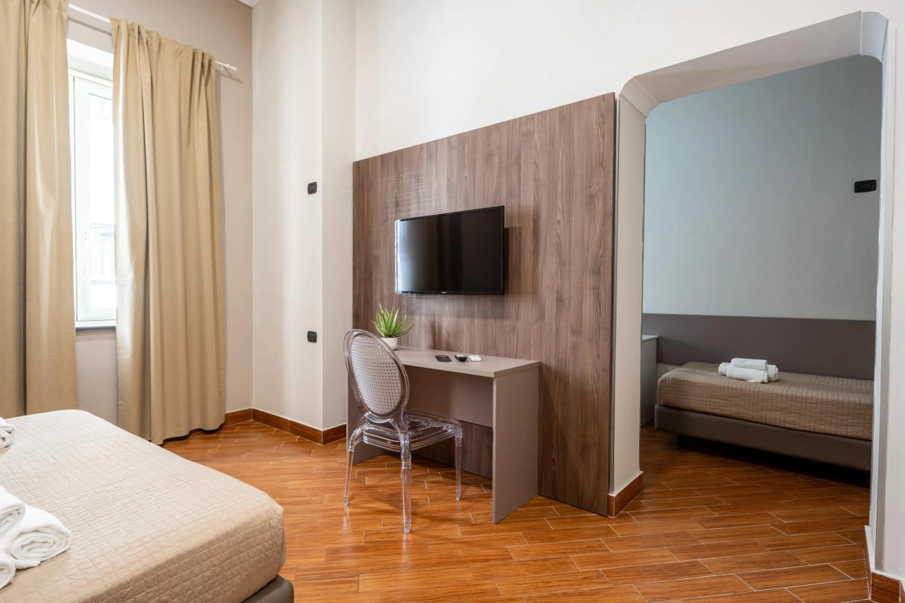 Quadruple Deluxe Room in Hotel Diamond