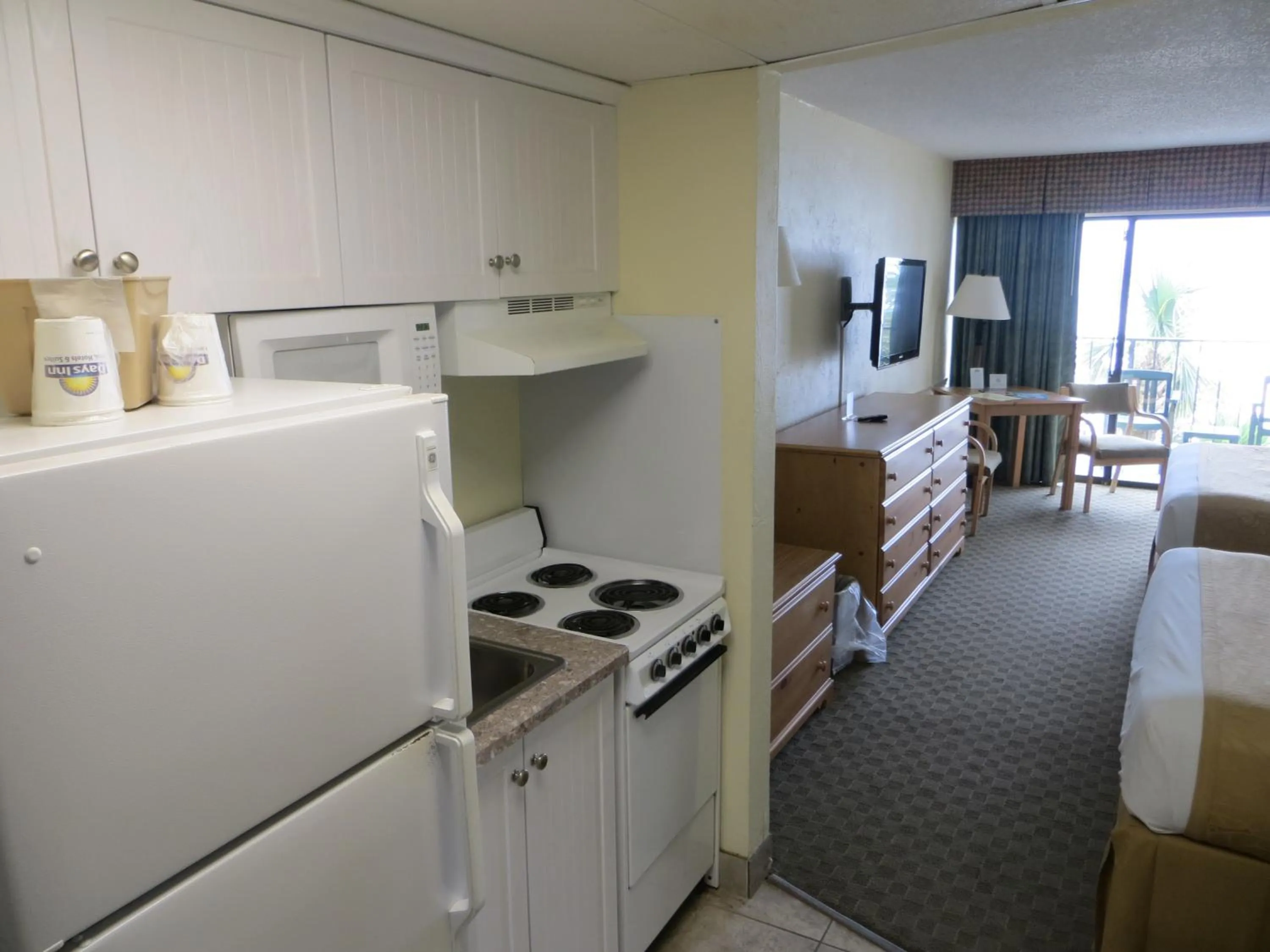 Efficiency Queen Room with Two Queen Beds - Oceanfront/Non-Smoking in Days Inn by Wyndham Daytona Oceanfront