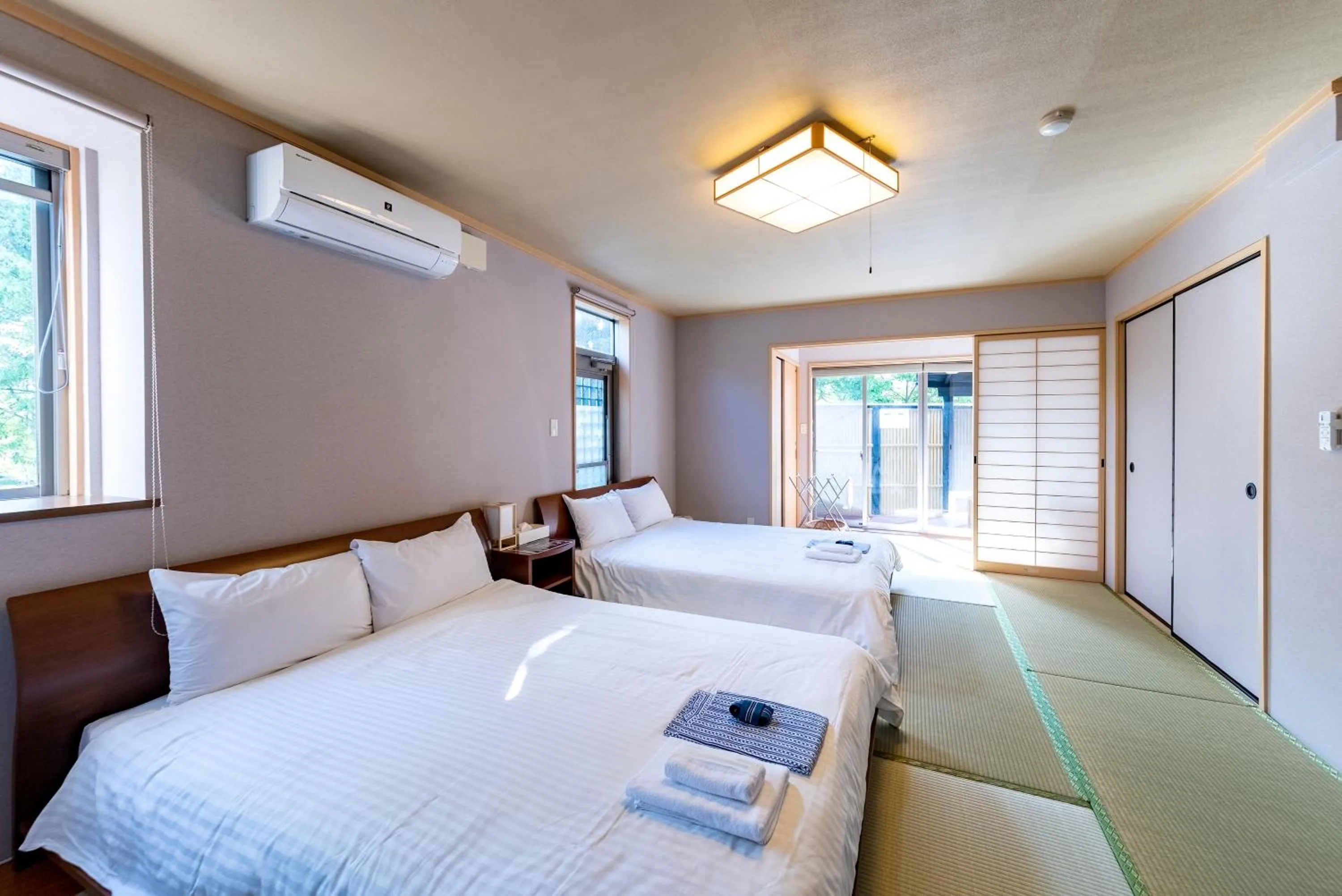 Japanese-Style Room with 2 Double Beds and Open-Air Bath in ETAVIA Yufuin Kinrinko