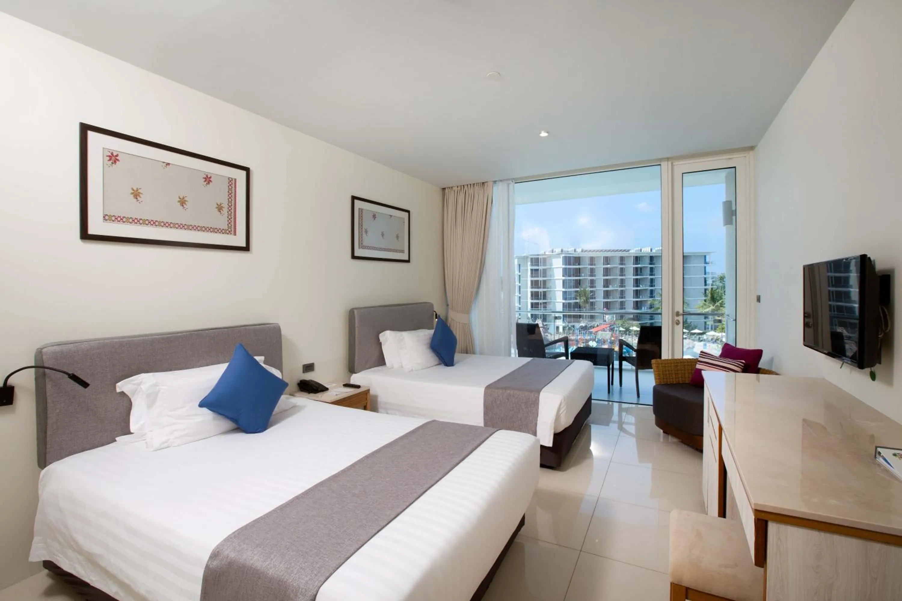 DD1B: Deluxe Double Double with balcony  in Splash Beach Resort Phuket Family-Friendly Water Park Resort Near Phuket Airport