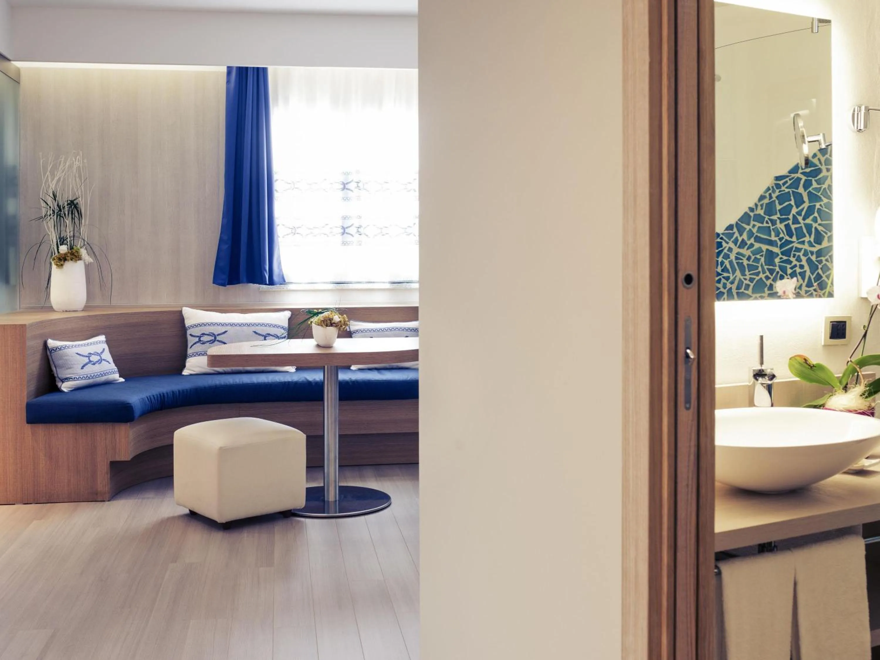 Standard Family Suite with 2 Connecting Rooms in Mercure Olbia