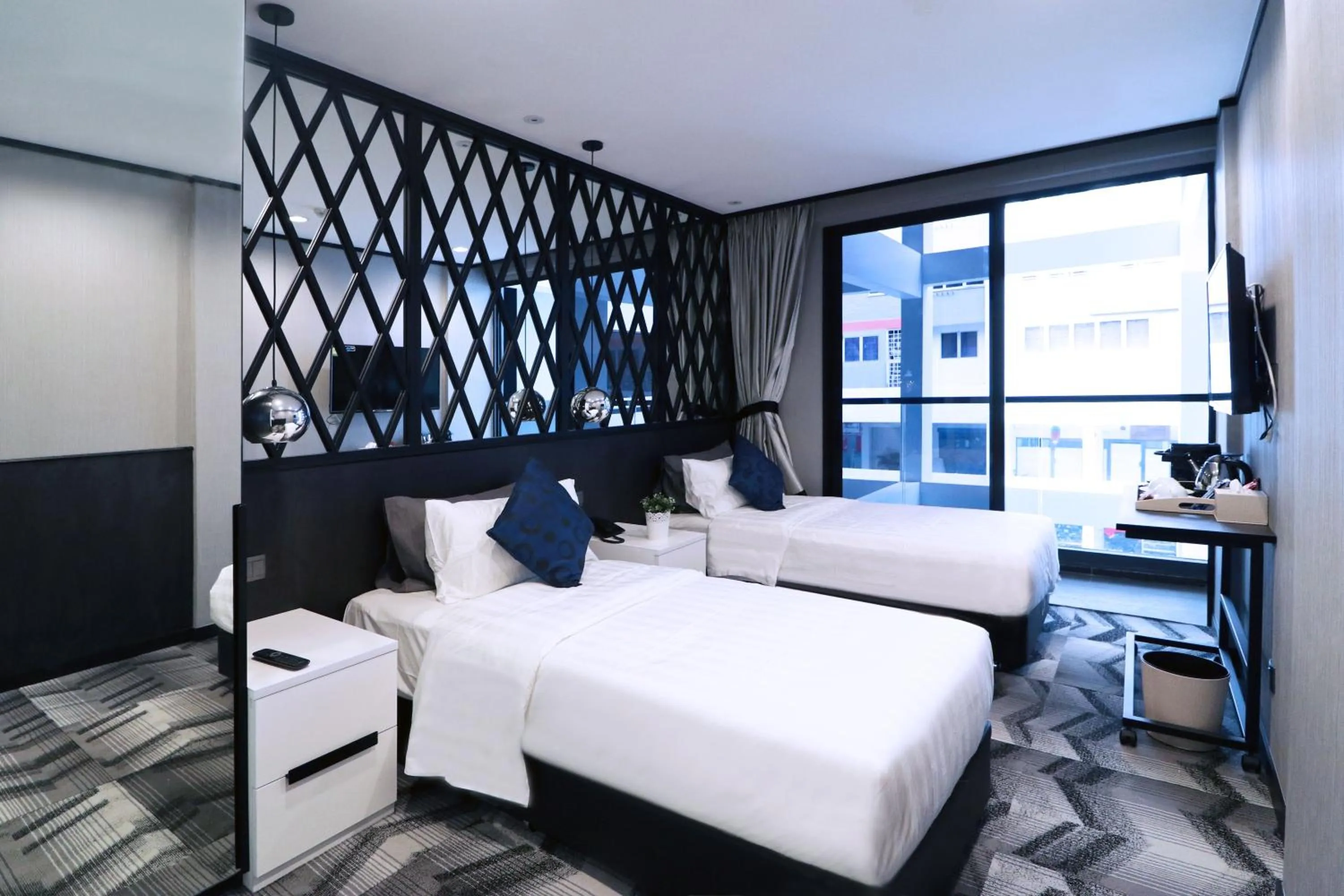 Twin Room with Balcony in Hotel NuVe Urbane