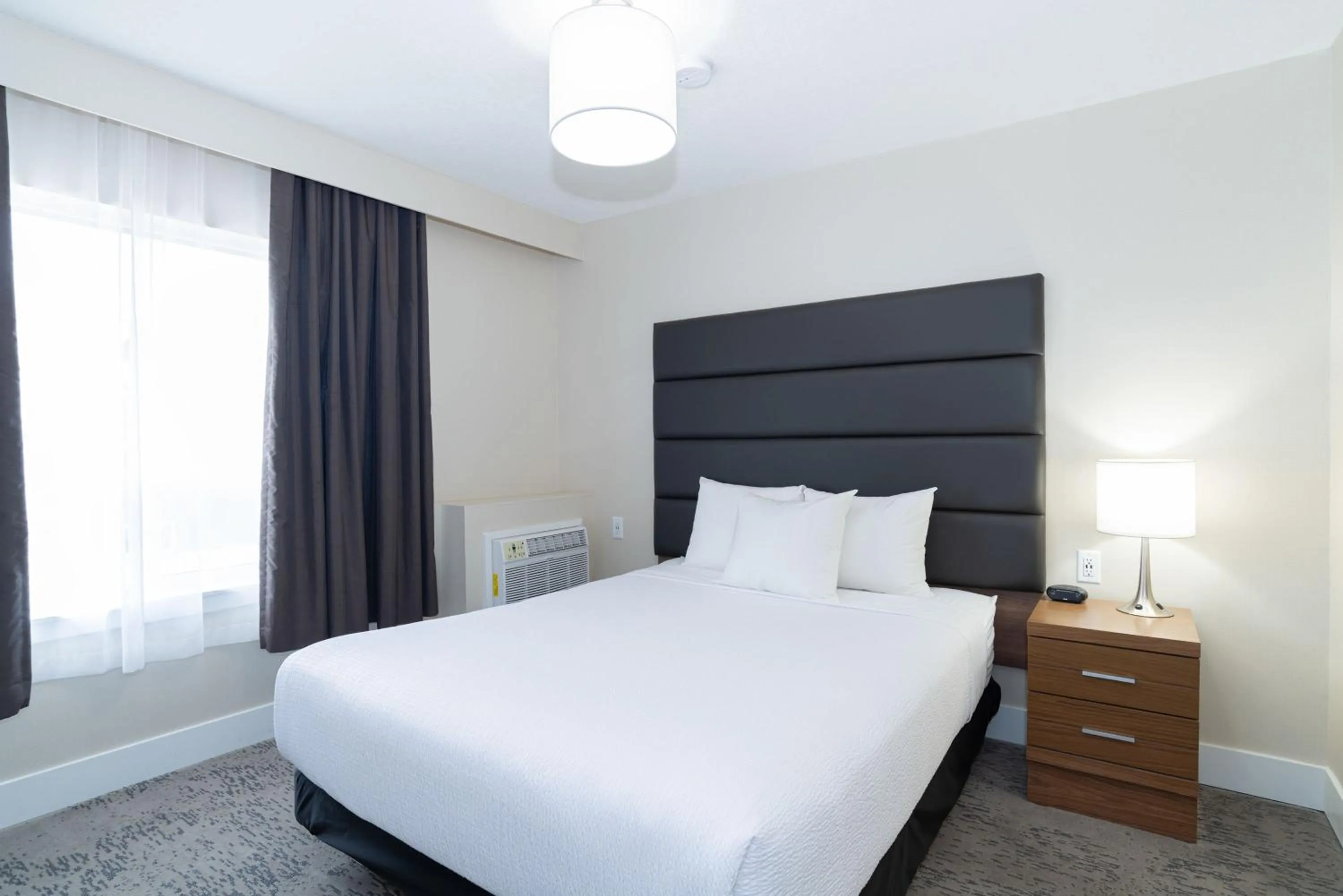 Grand Suite, 1 Queen Bed, Sofa Bed, Kitchenette in Sandman Hotel Grande Prairie