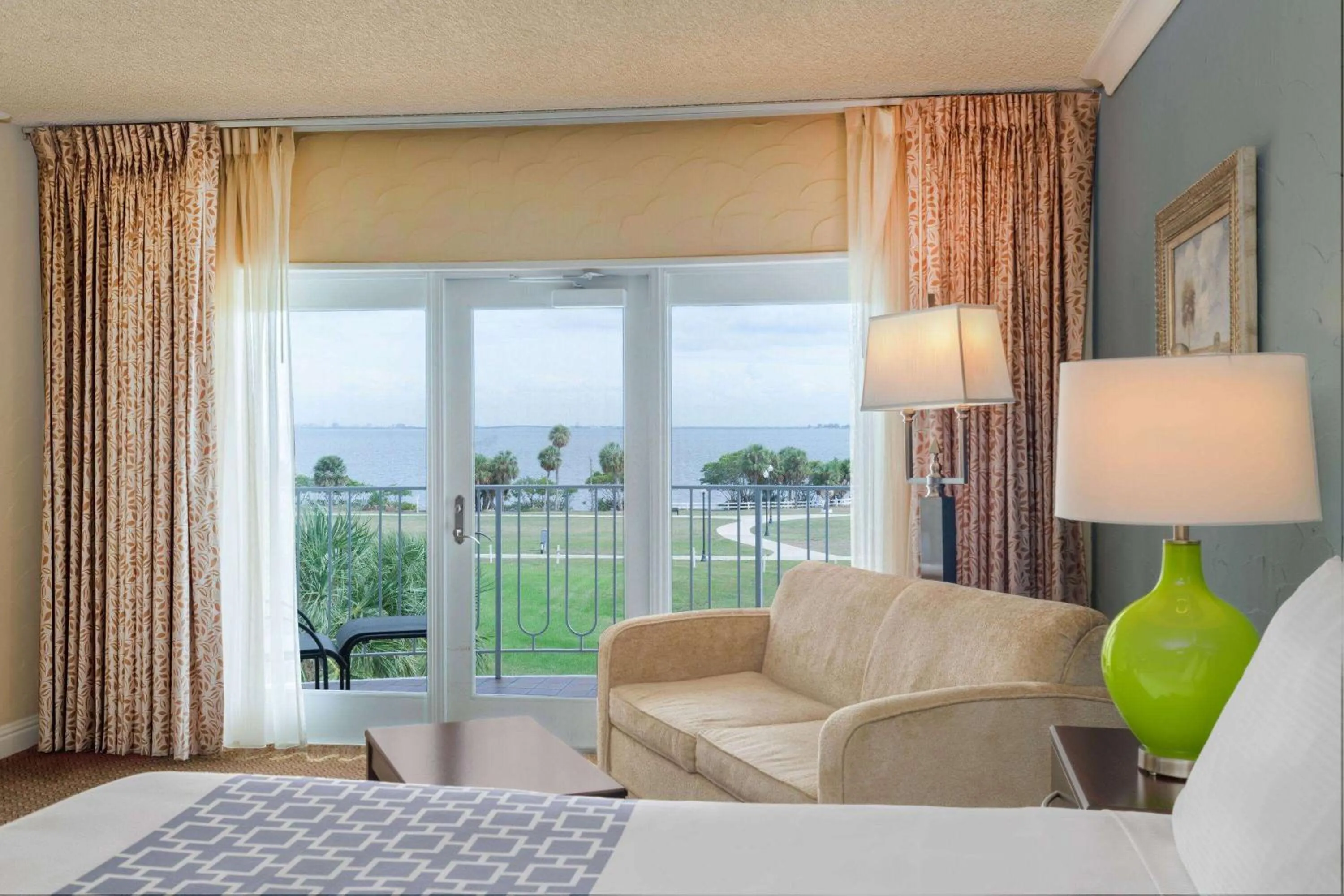 Deluxe King Room with Balcony and Bay View - Non-Smoking in Safety Harbor Resort & Spa Trademark Collection by Wyndham