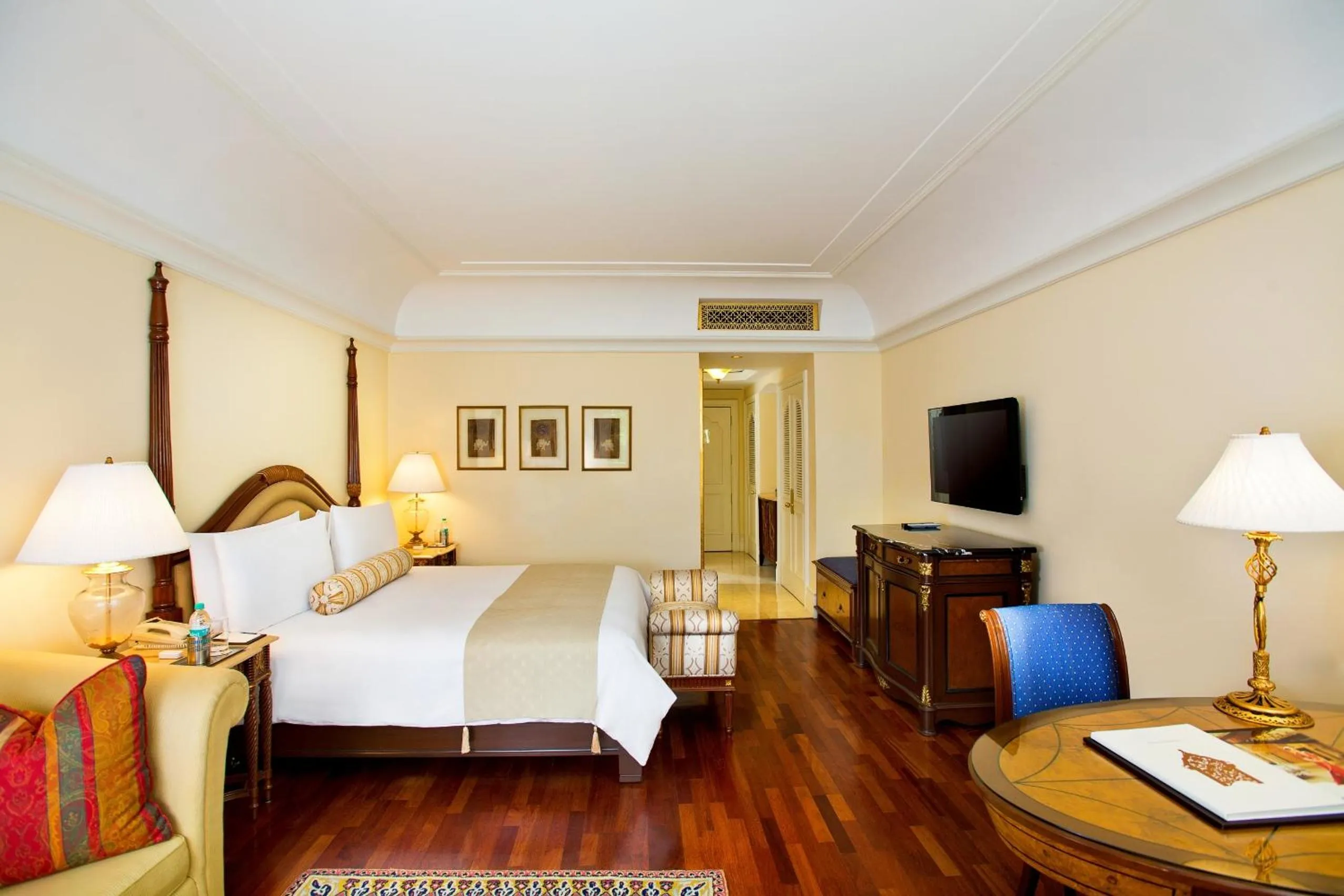 Deluxe Room with Balcony overlooking the Poolside / Garden - single occupancy in The Leela Palace Bengaluru