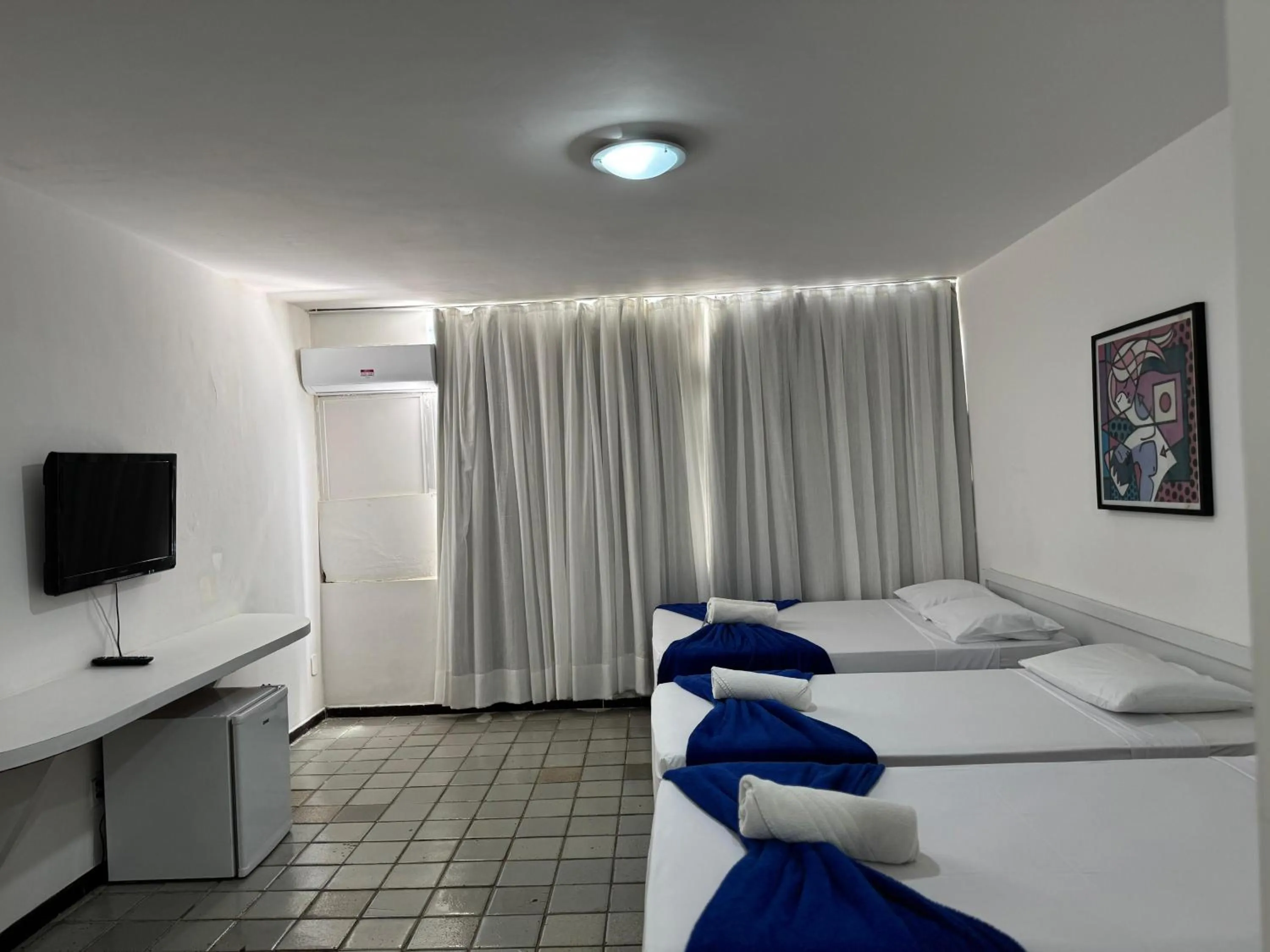 Standard Triple Room in Praia Hotel Enseada