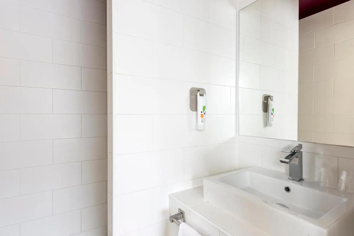 Standard Room with One Double Bed and One Single Bed in ibis Styles Saint Julien en Genevois Vitam