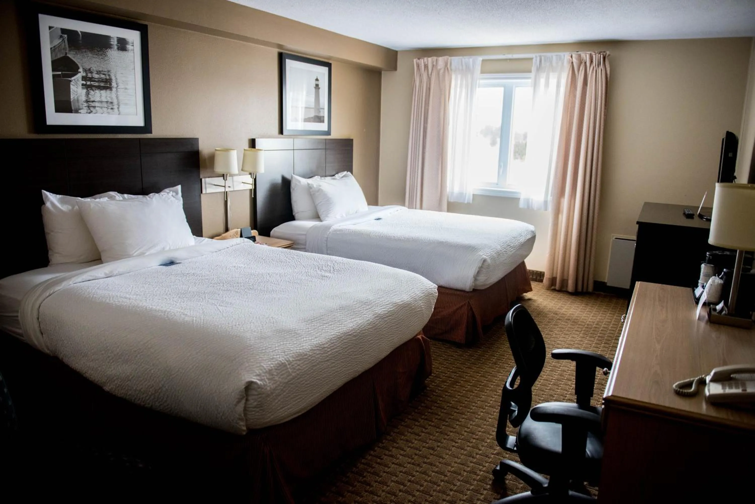 One-Bedroom Suite with Two Queen Beds - Non-Smoking in Travelodge Suites by Wyndham Moncton