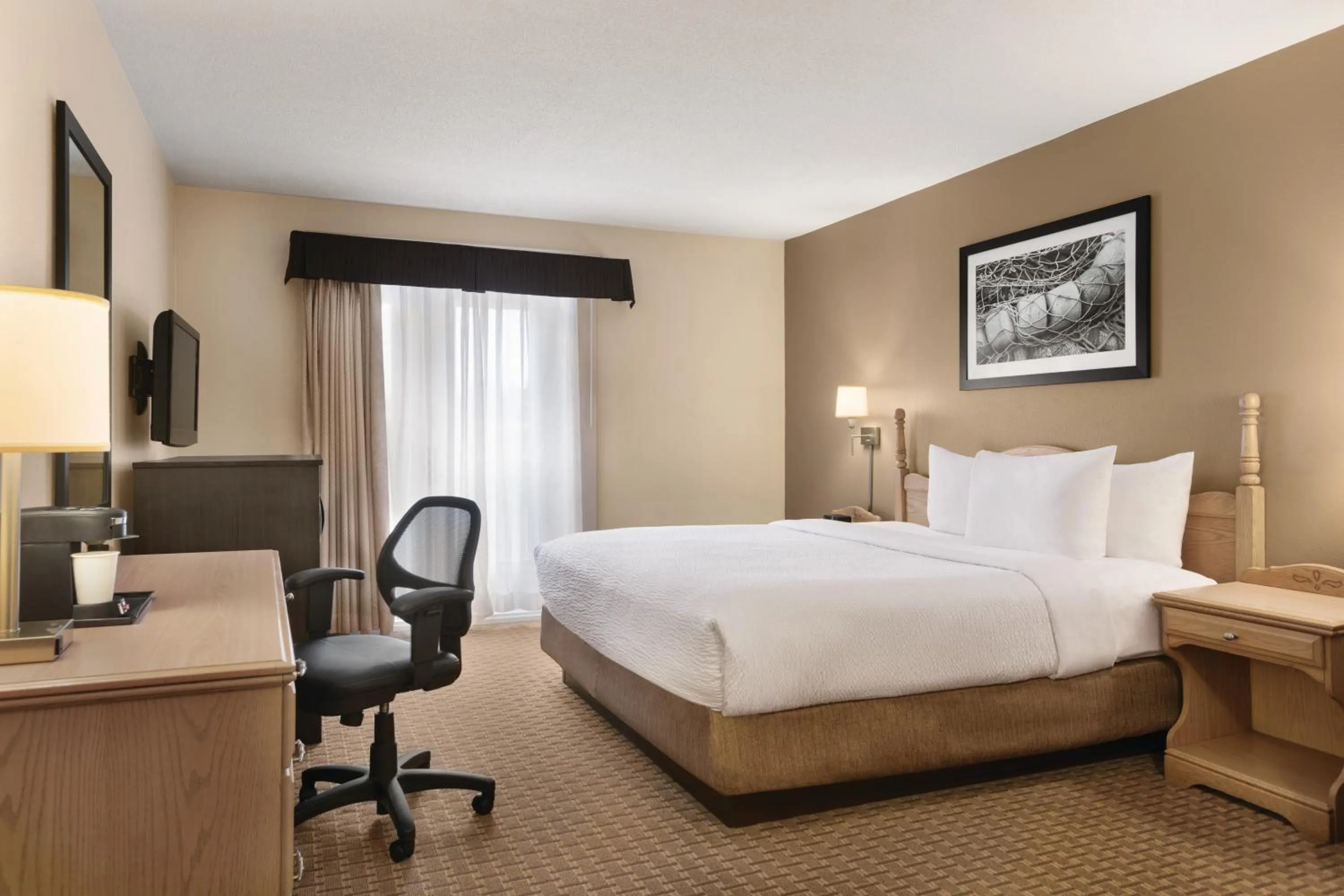 One-Bedroom King Suite - First Floor/Non-Smoking in Travelodge Suites by Wyndham Moncton