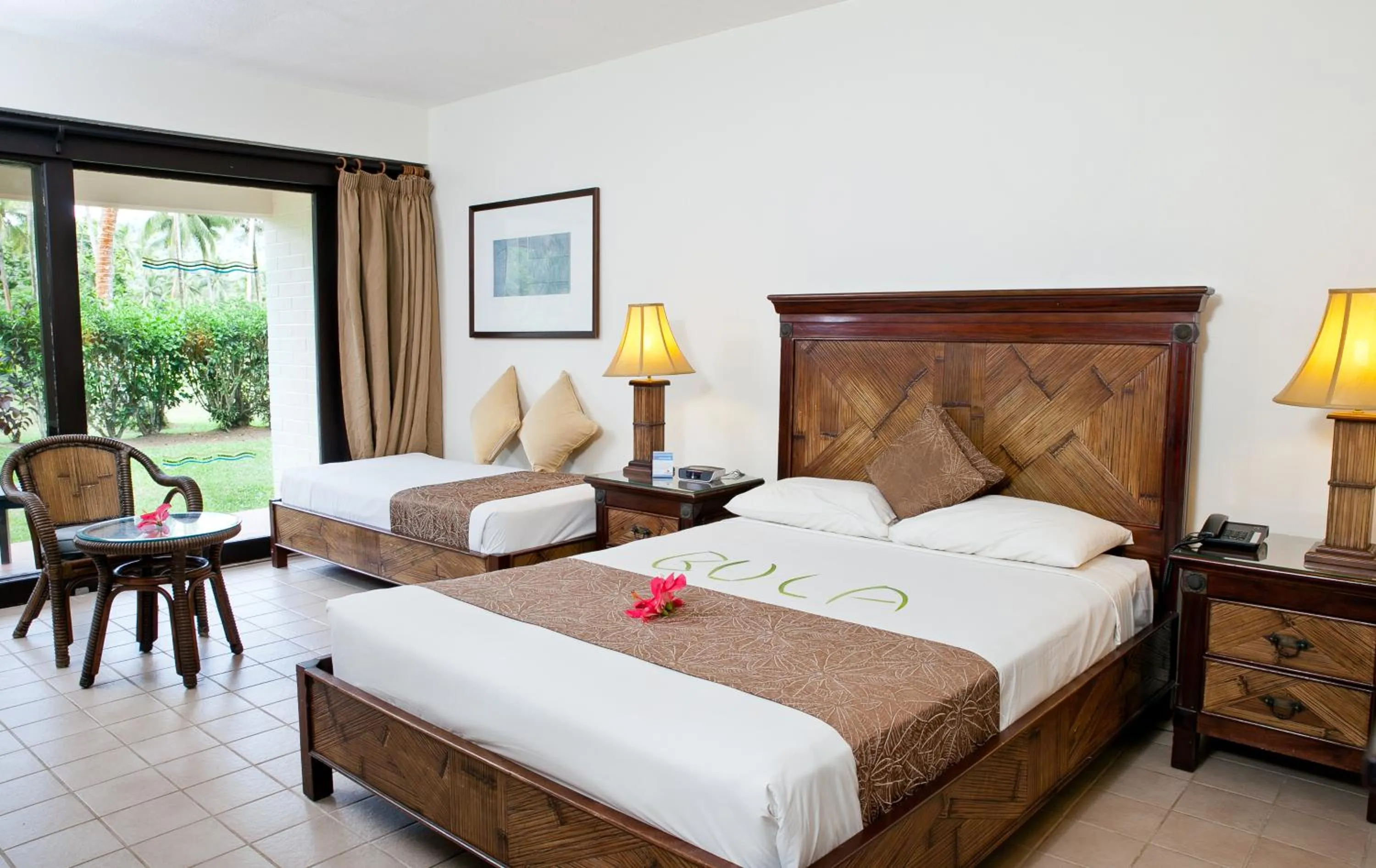 Standard Queen Room with Garden View  in The Naviti Resort
