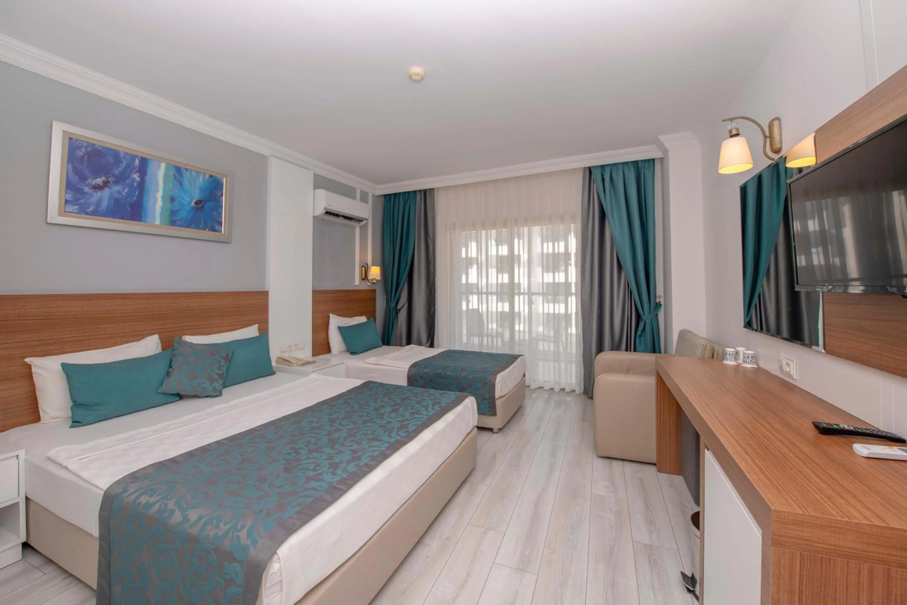 Standard Triple Room in Armas Beach