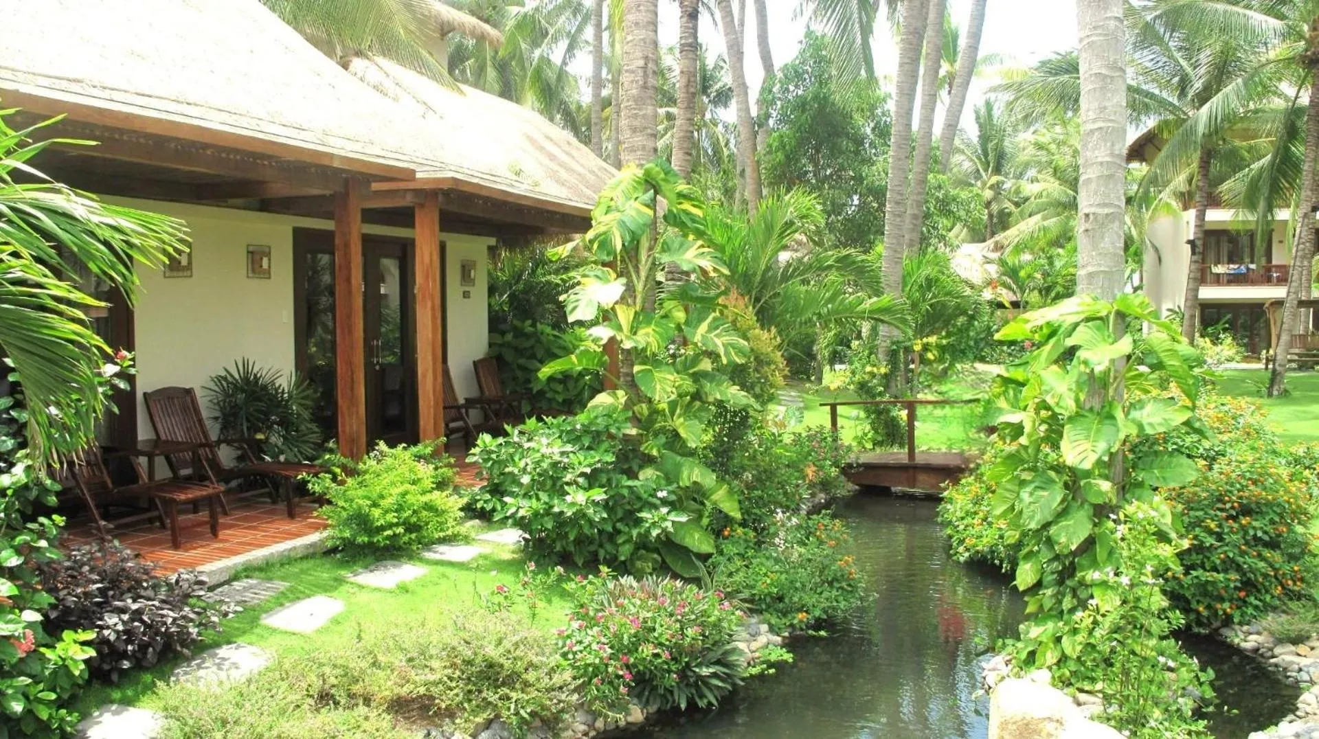 Serene Oasis Bungalow with Garden View in Bamboo Village Beach Resort & Spa