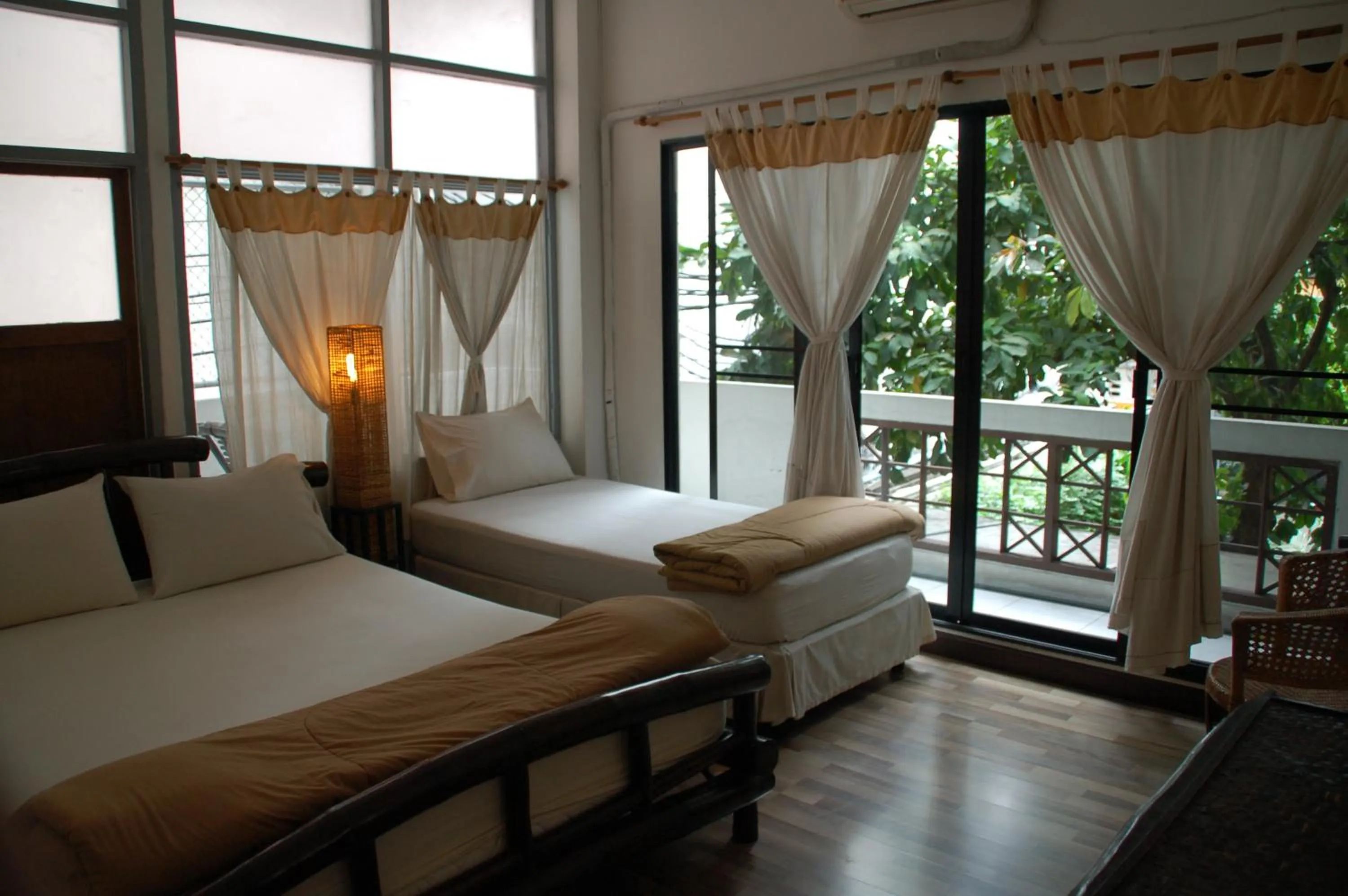 Triple Room with Balcony in Lamphuhouse Bangkok