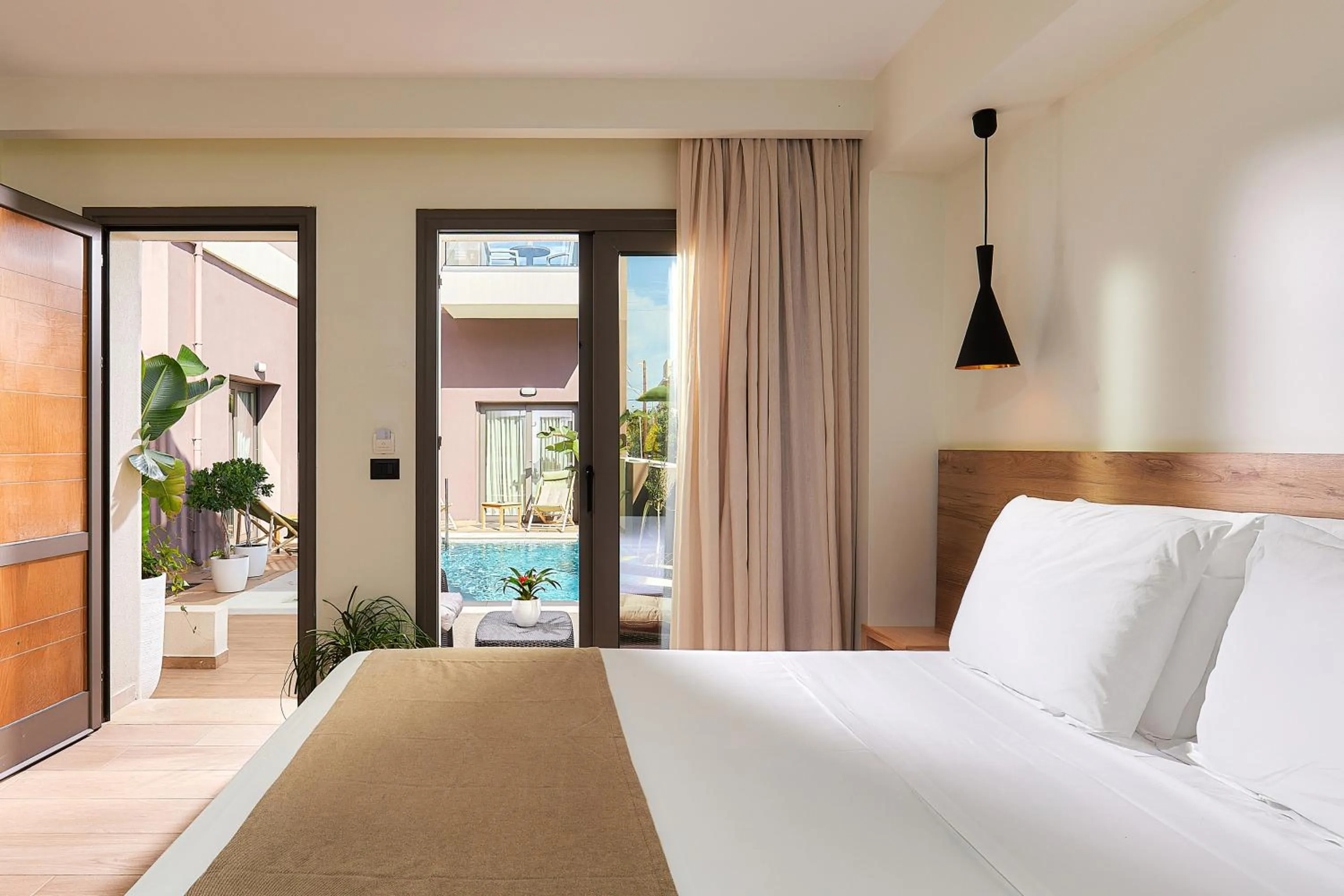 Triple Room Sharing Pool in Dionisos Hotel