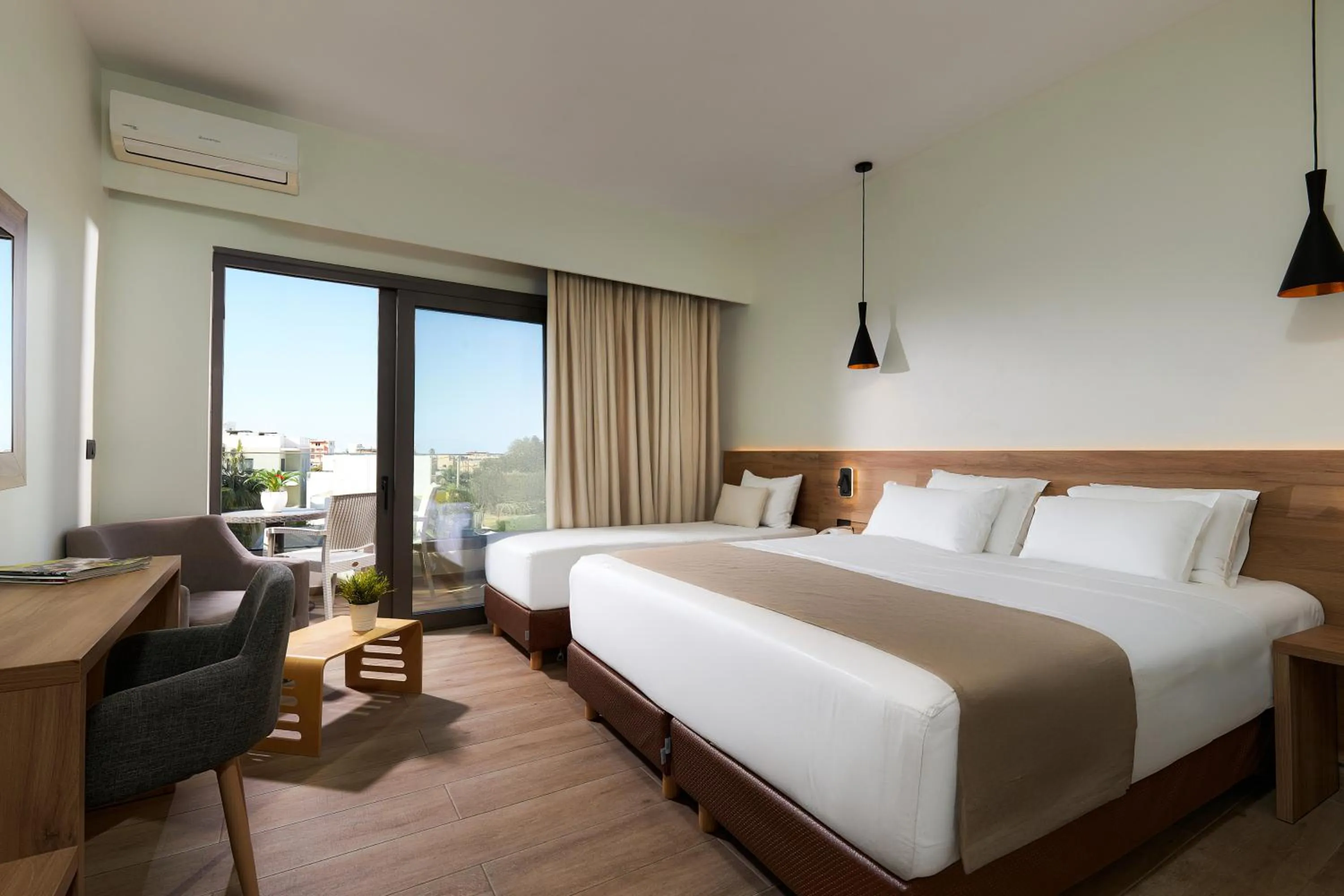 Triple Room in Dionisos Hotel