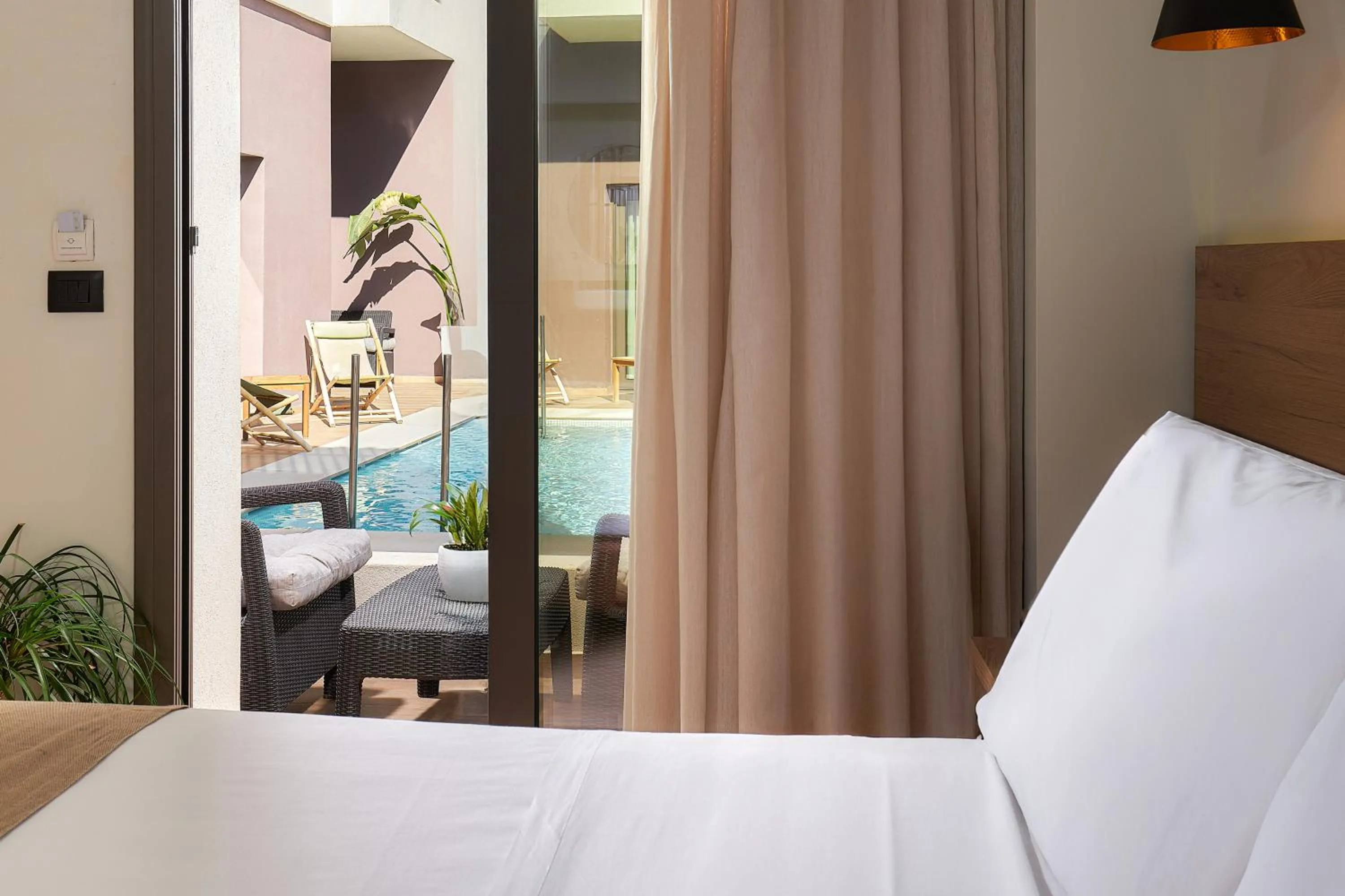Double Room Sharing Pool in Dionisos Hotel