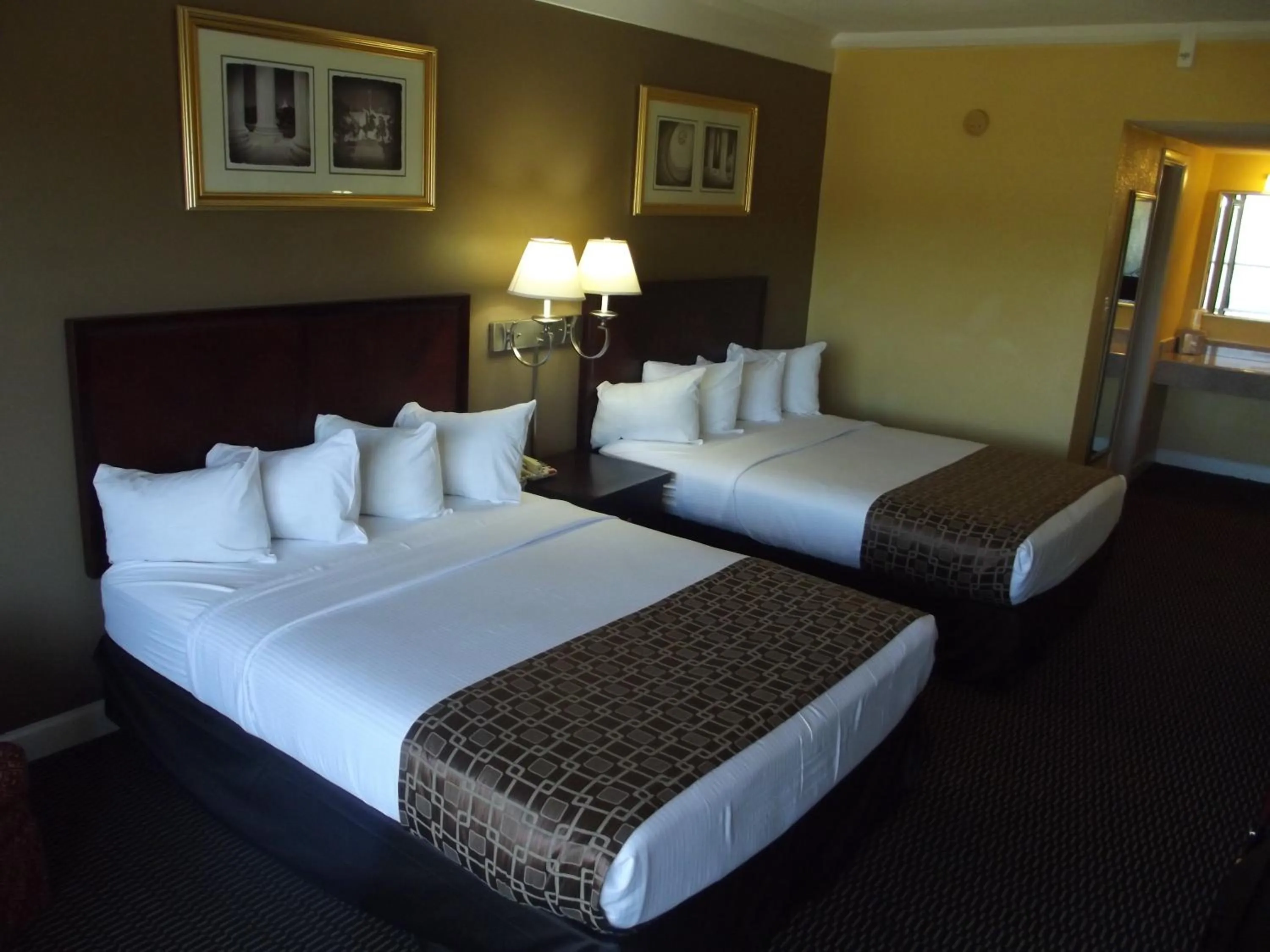 Deluxe Room with Two Queen Beds - Non-Smoking in Ambassadors Inn & Suites