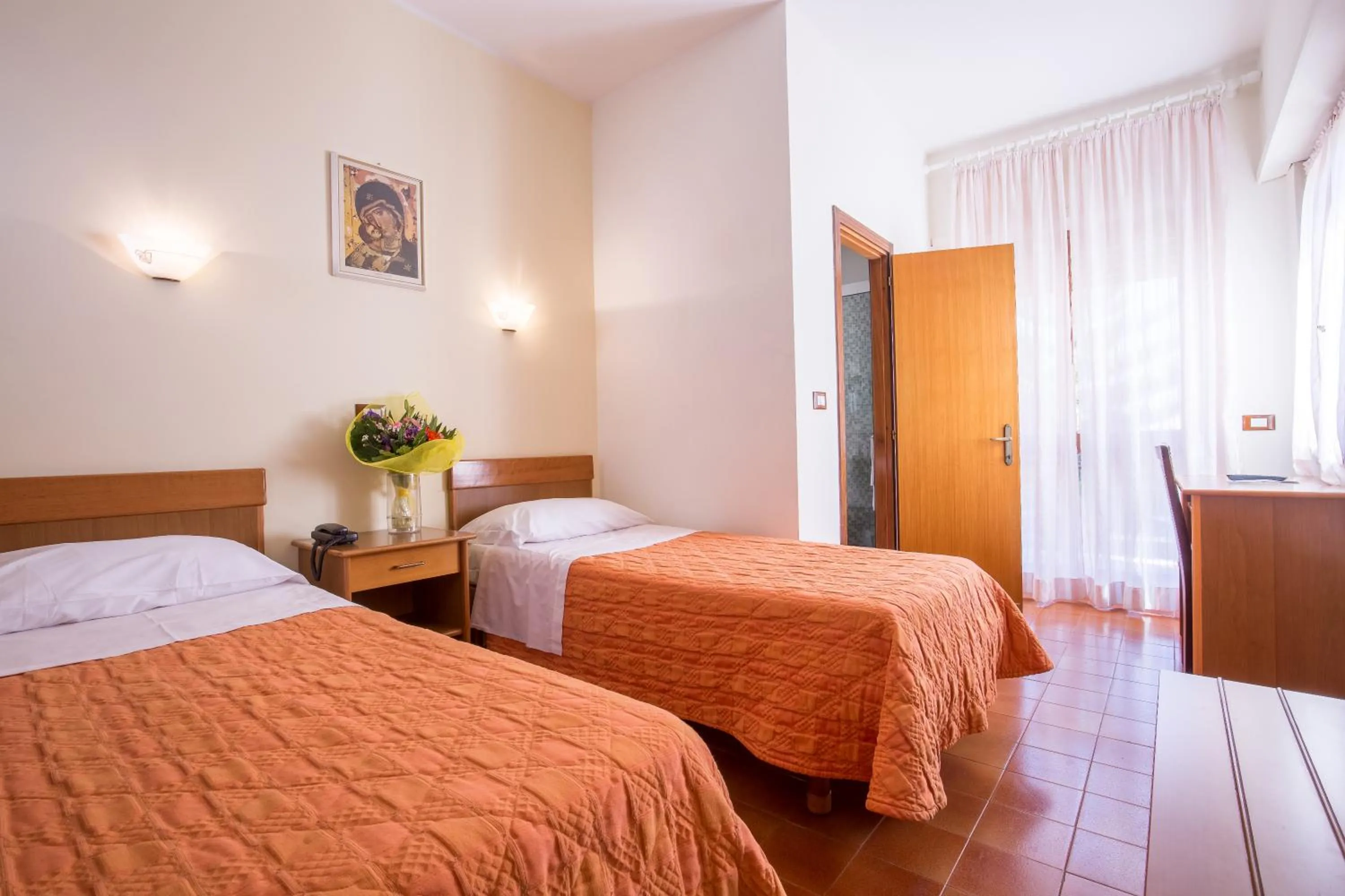 Family triple room in Hotel Casa Tra Noi