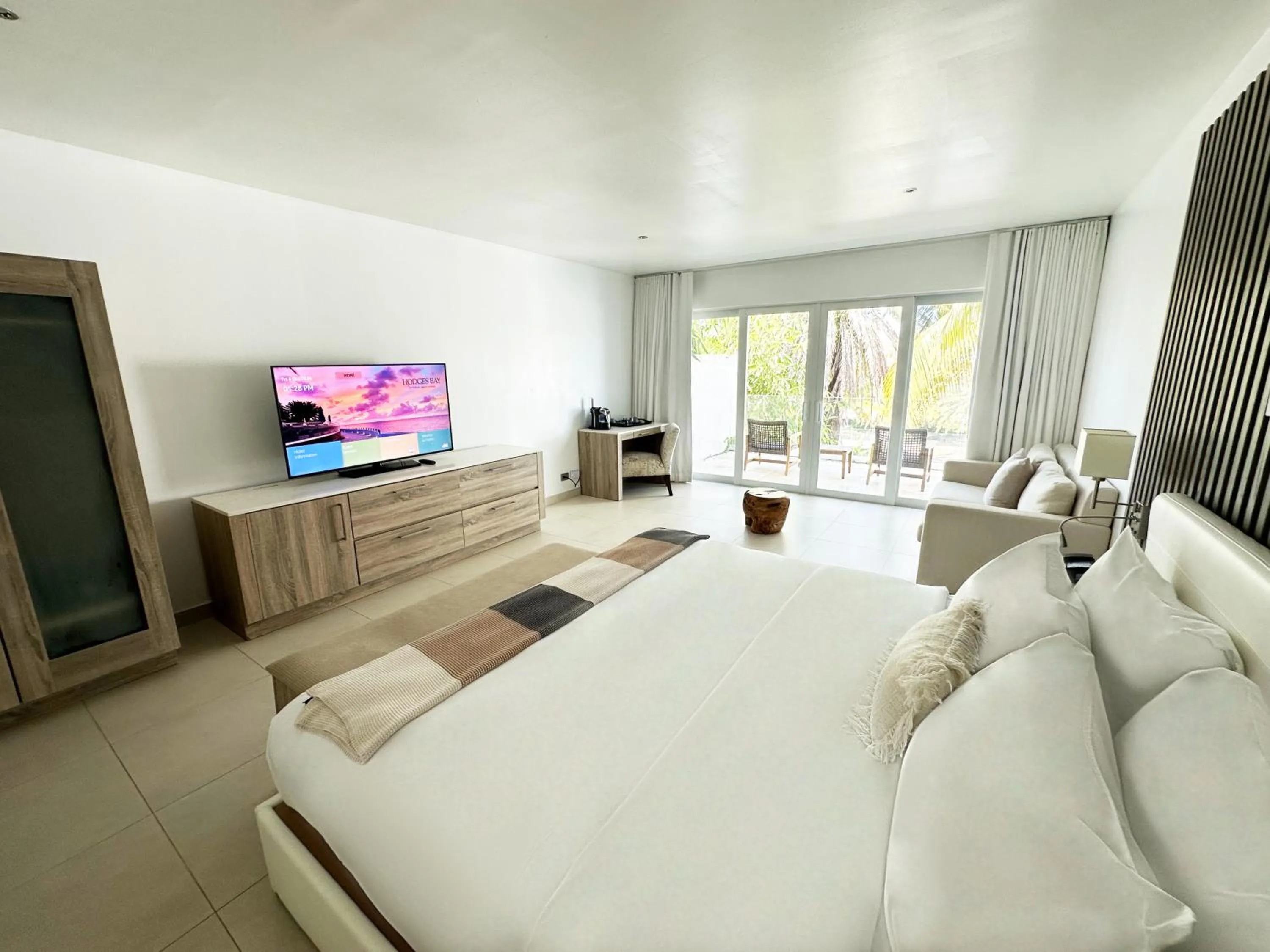 Pool or Garden Junior Suite in Hodges Bay Resort & Spa, an HQ Luxury Resort & Residences