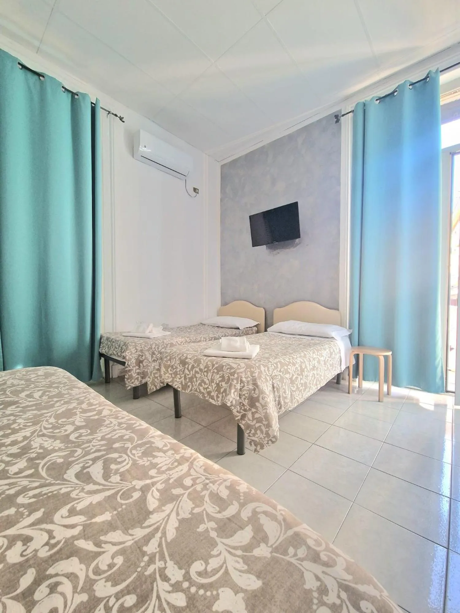 Quadruple Room in Hotel Le Orchidee