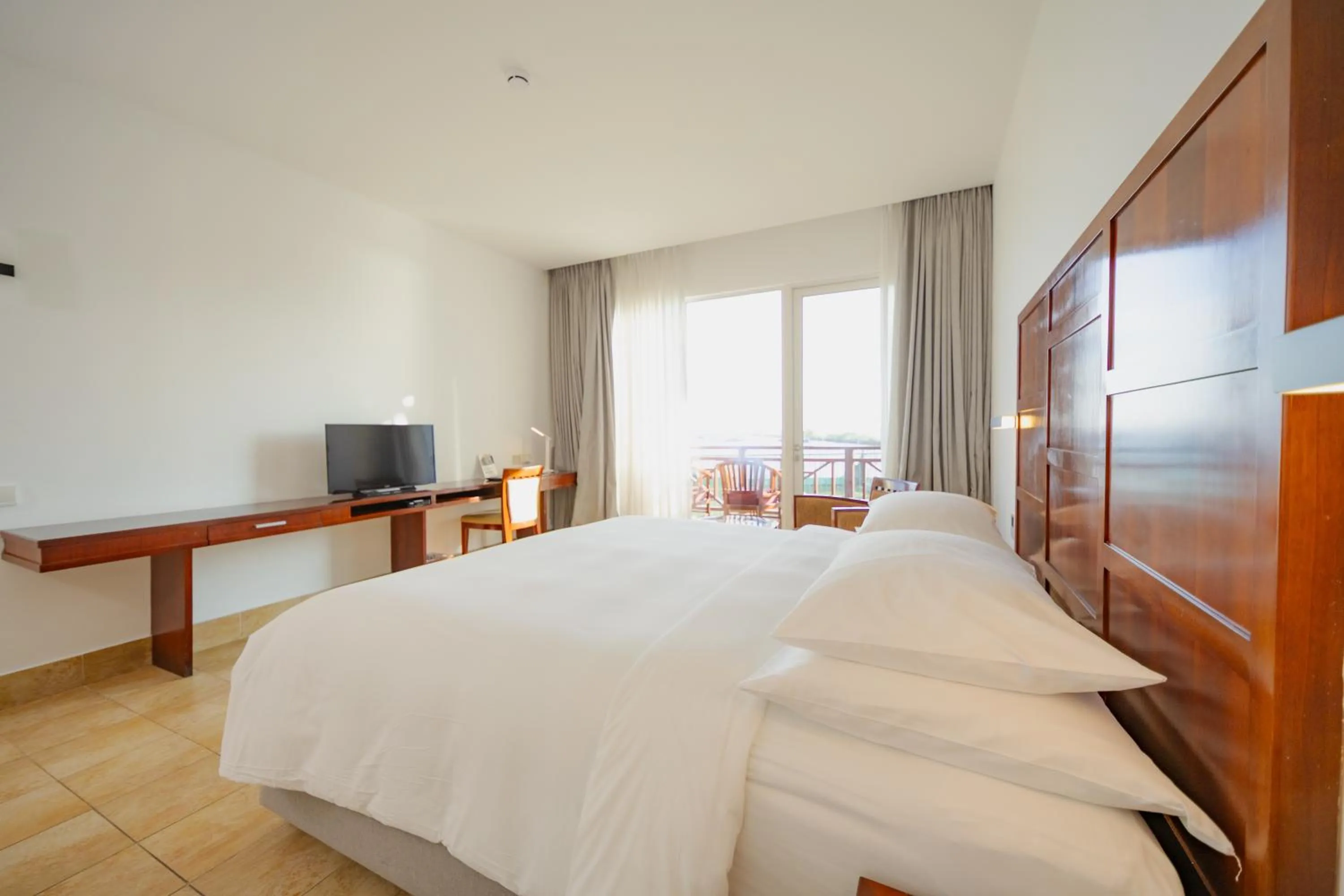 Deluxe Garden View in Hulhule Island Hotel- Private Beach Access & Airport Pick-up and Drop