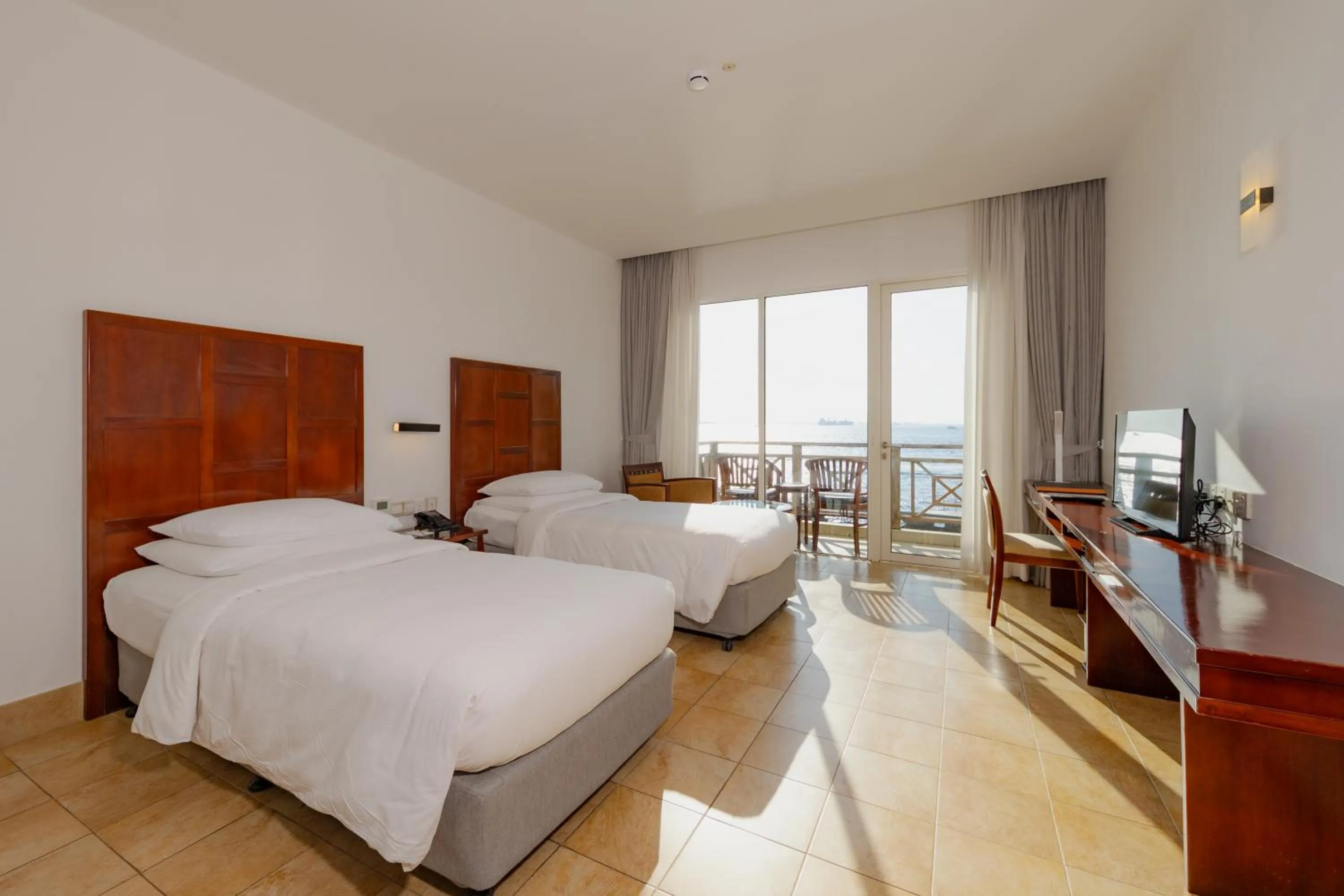 Deluxe Seaview View Twin in Hulhule Island Hotel- Private Beach Access & Airport Pick-up and Drop