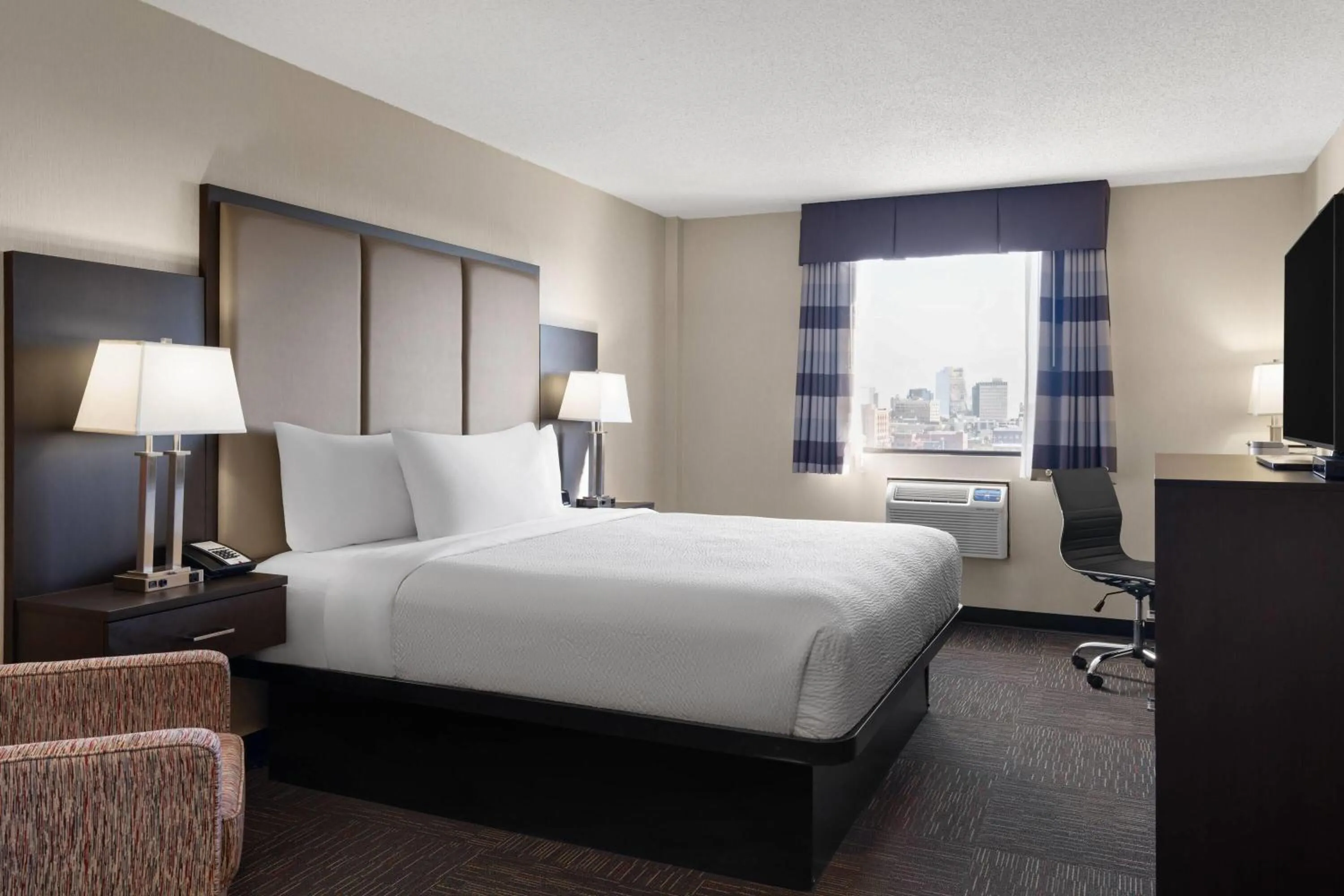 Superior King Suite with City View - Non Smoking in Ramada by Wyndham Saskatoon