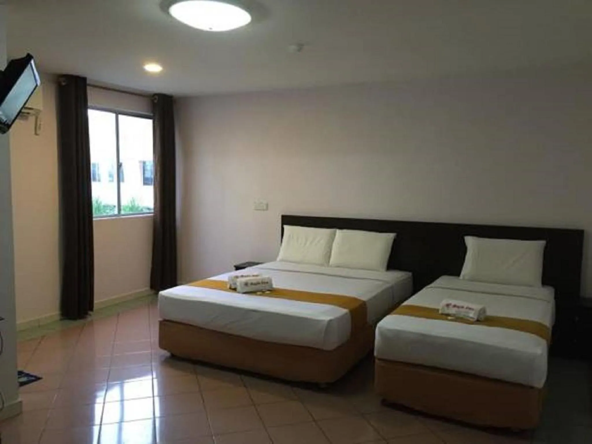 Superior Triple Room in Raja Inn