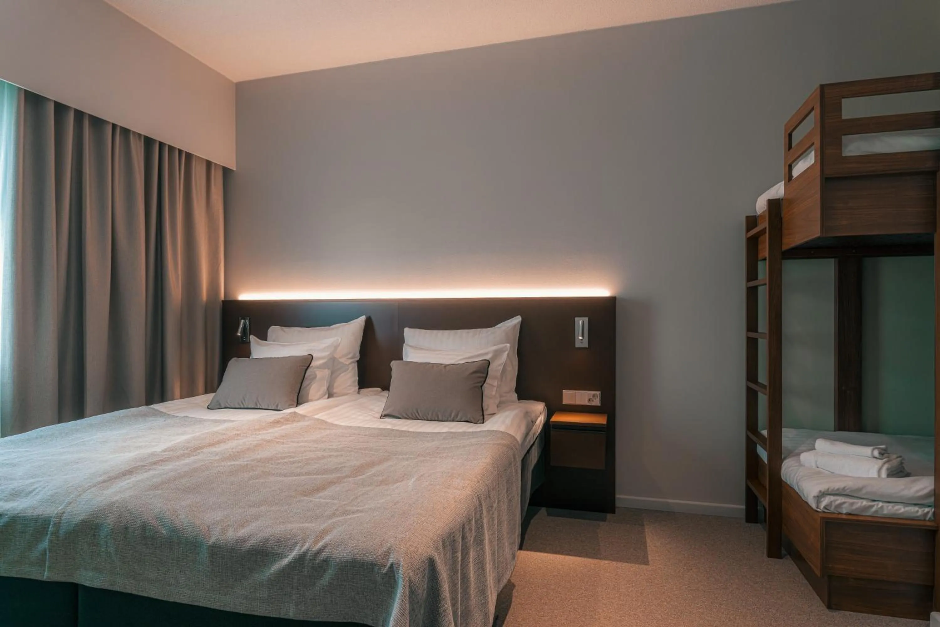 Apartment with double bed and bunk bed for two kids in Original Sokos Hotel Seurahuone Savonlinna