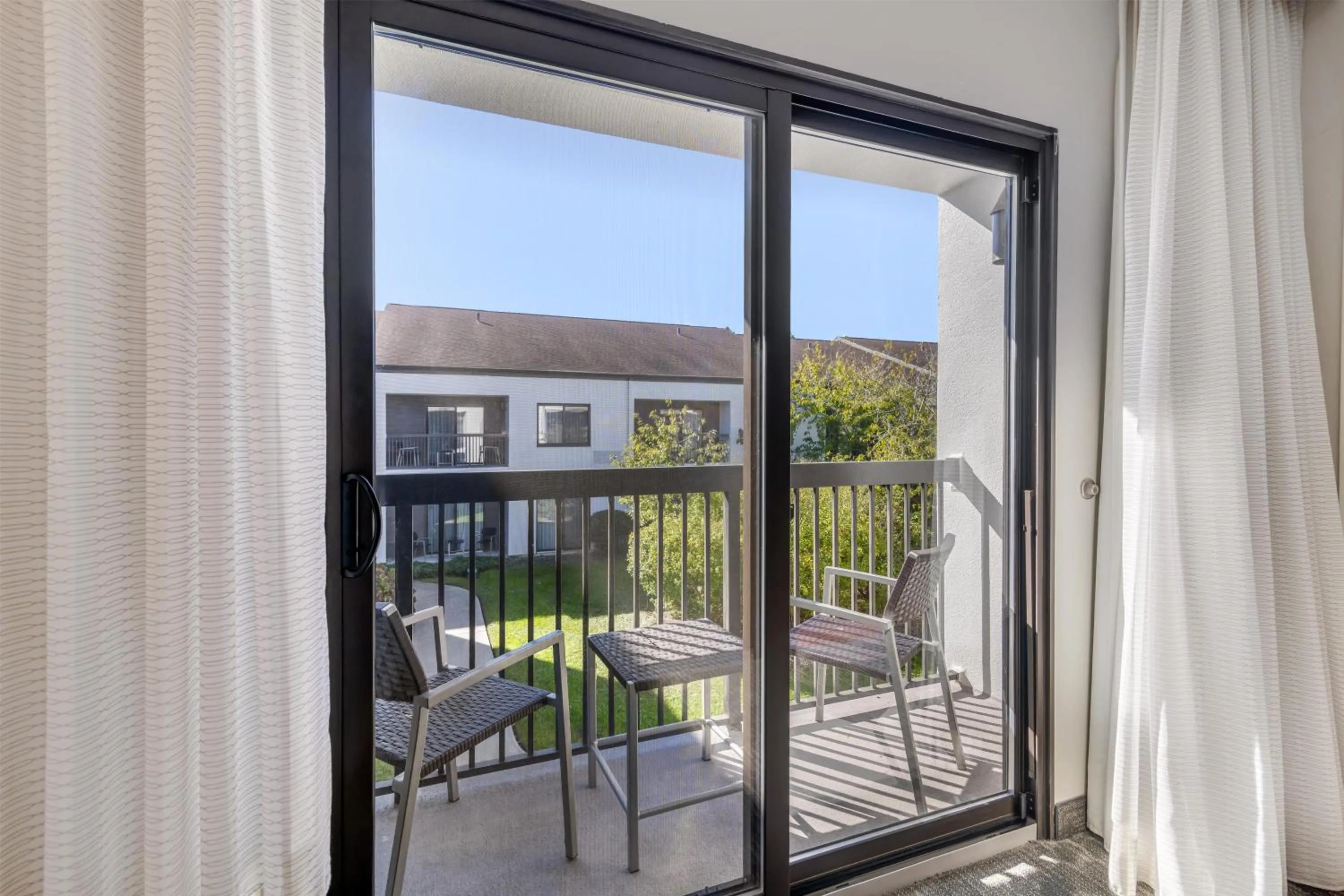 Deluxe King with Balcony in Sonesta Select Newport Middletown