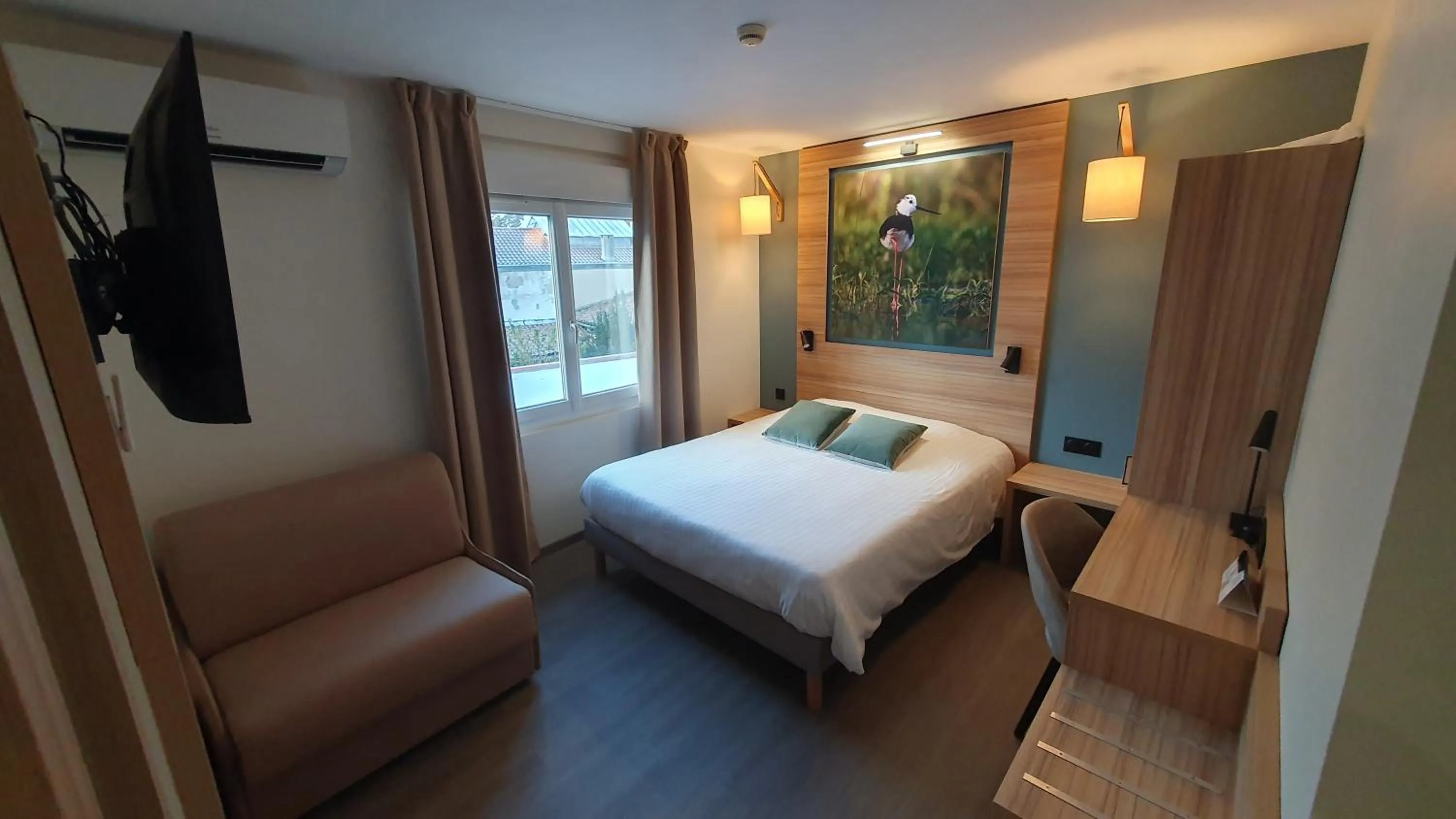 Family Room in Logis Hôtel - Les Pasteliers