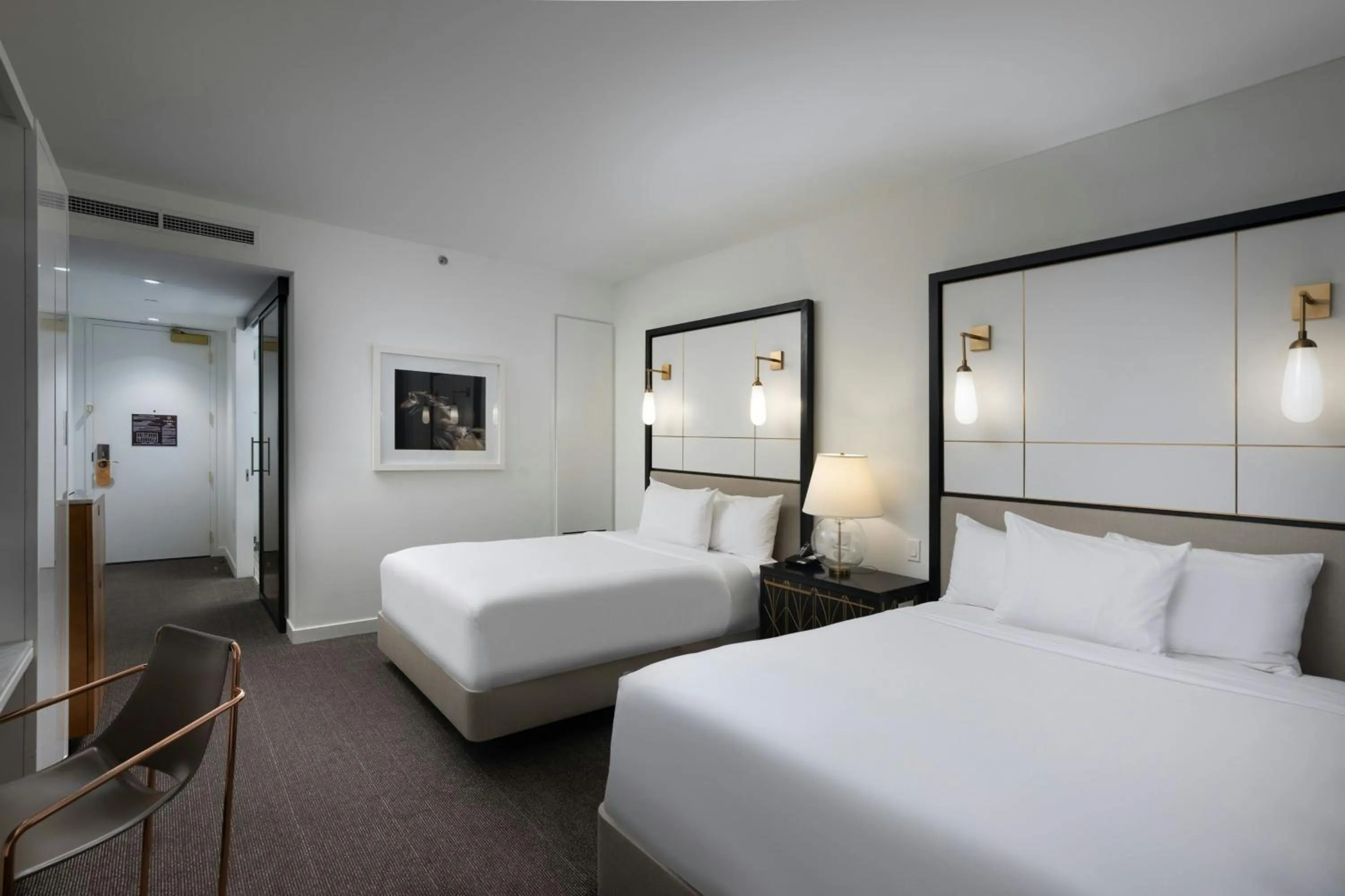 Queen Room with Two Queen Beds - Hearing Accessible in The Laura Hotel, Houston Downtown, Autograph Collection