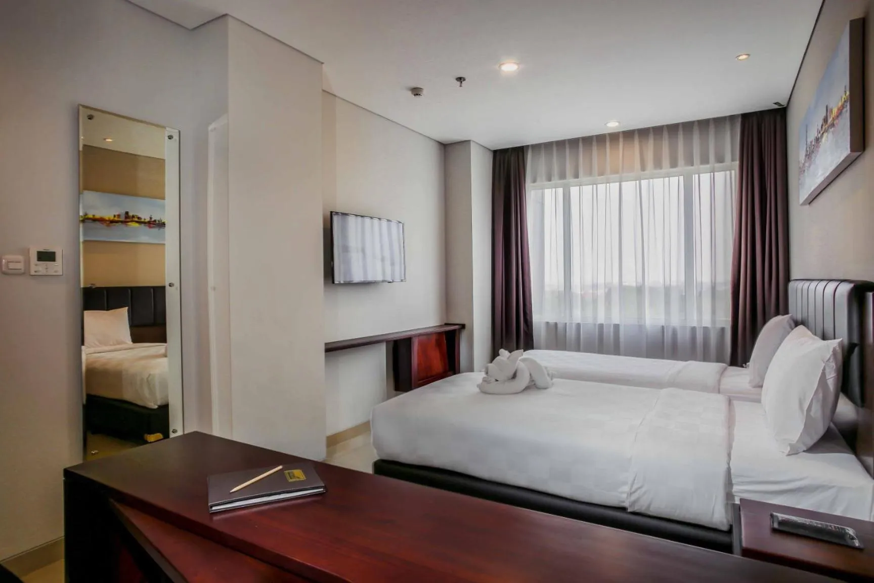 Superior Twin Room in PrimeBiz Hotel Surabaya
