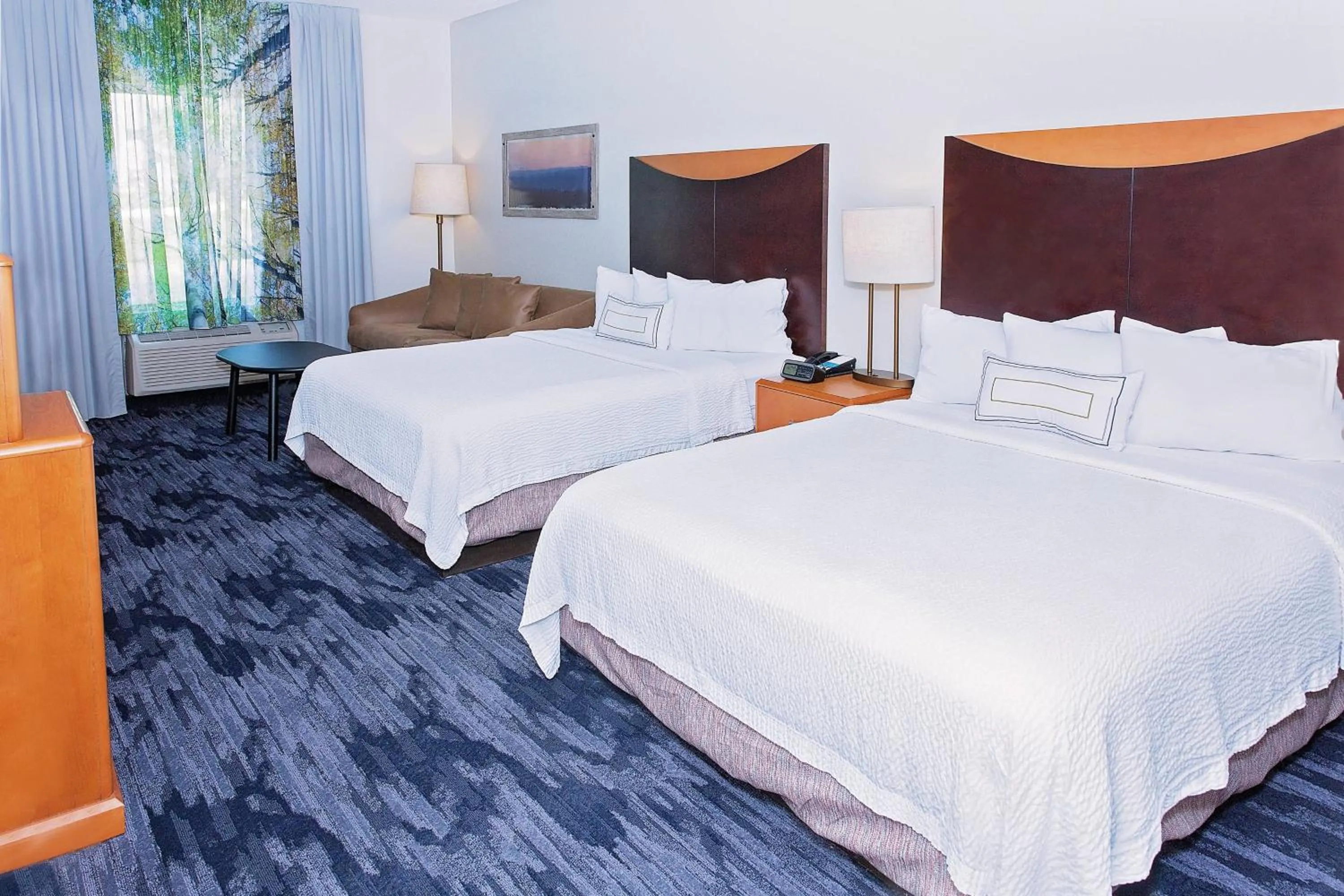 Larger Guest room, 2 Queen, Sofa bed   in AmericInn by Wyndham Hays