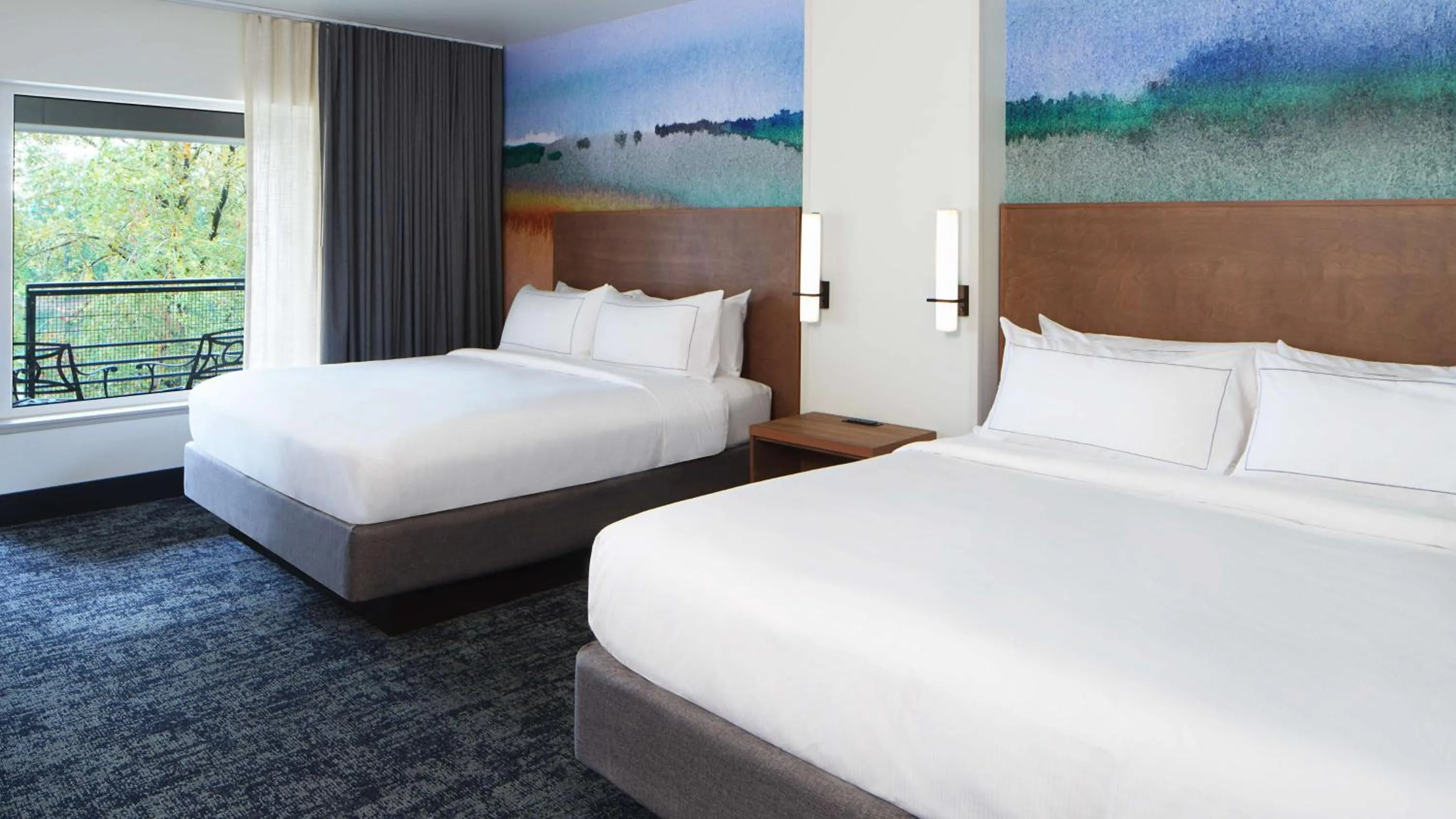King Room with Two King Beds and Balcony - River View in River's Edge Hotel Portland, Tapestry Collection by Hilton