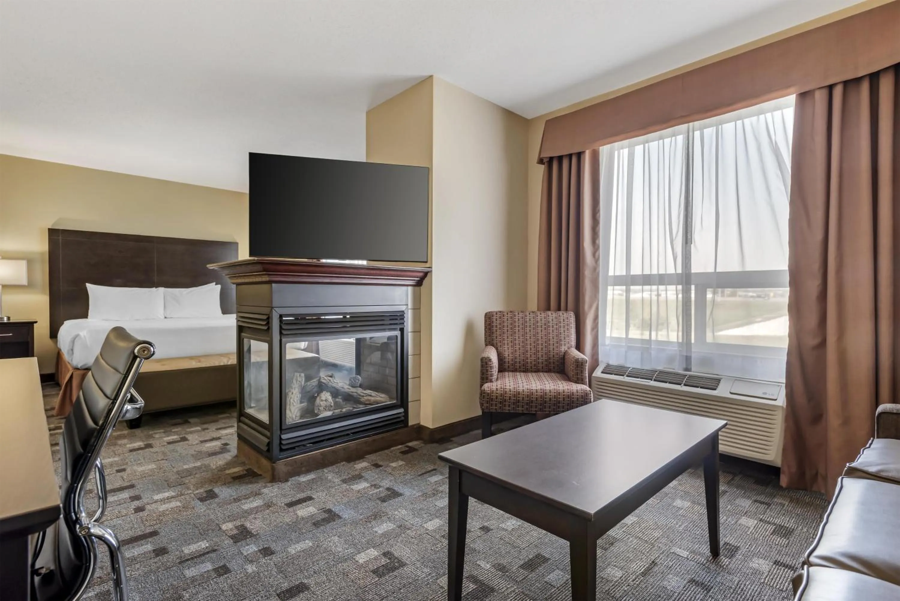 King Suite with Spa Bath and Fireplace in Best Western Plus Red Deer Inn & Suite