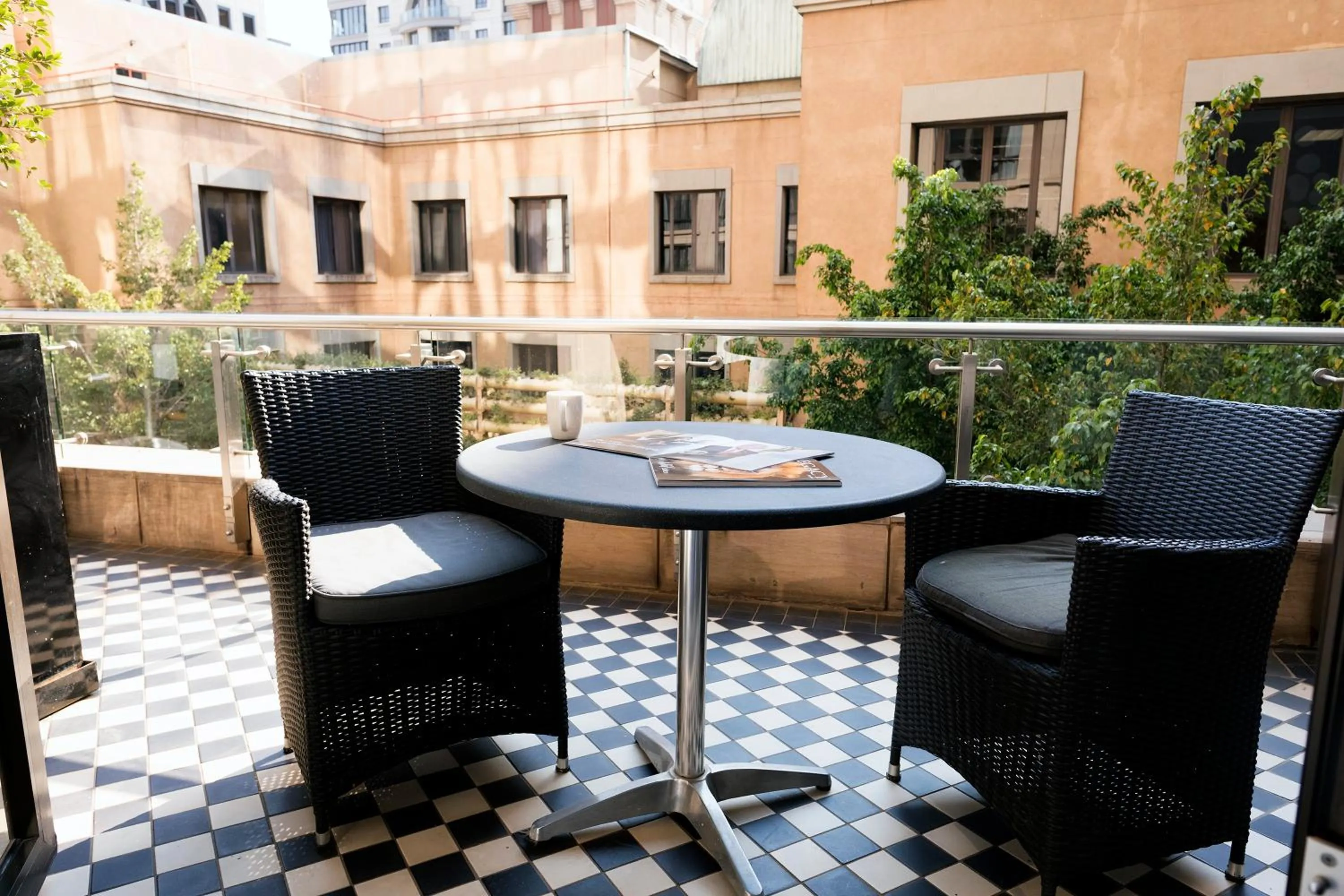 Deluxe King Room with Patio - single occupancy in DAVINCI Hotel on Nelson Mandela Square