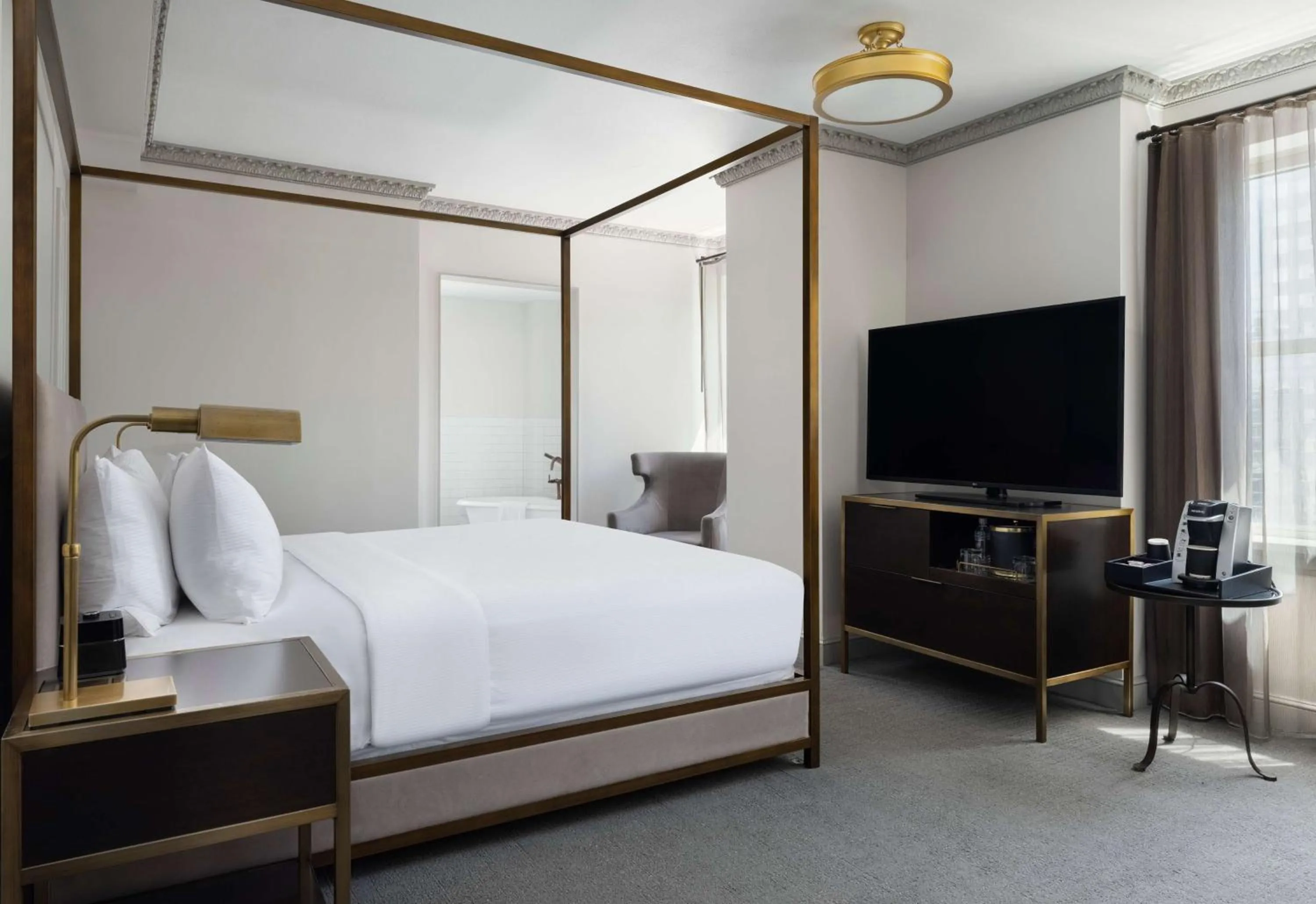 King Corner Room in Hotel Phillips Kansas City, Curio Collection By Hilton