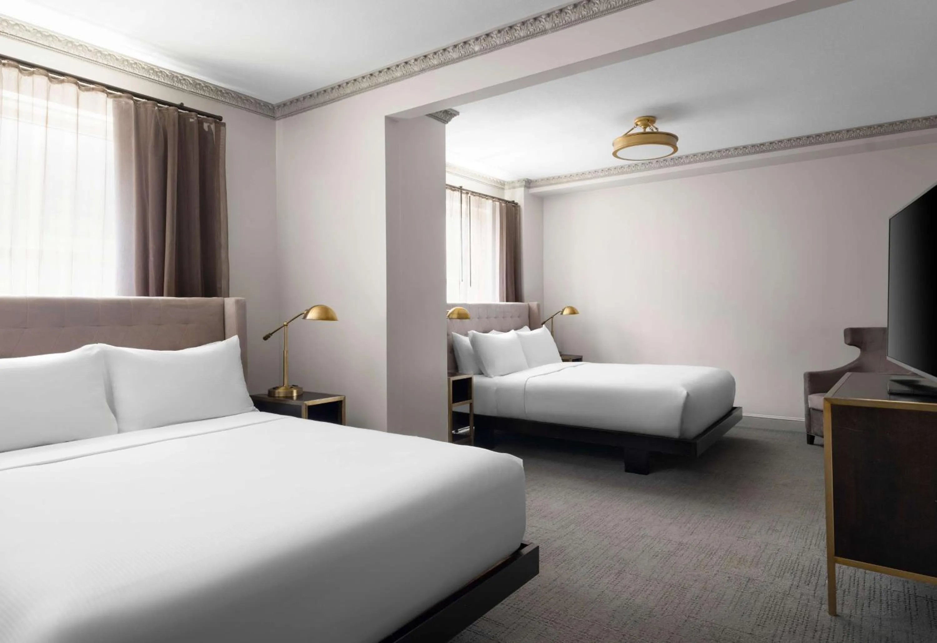 Queen Room with Two Queen Beds in Hotel Phillips Kansas City, Curio Collection By Hilton