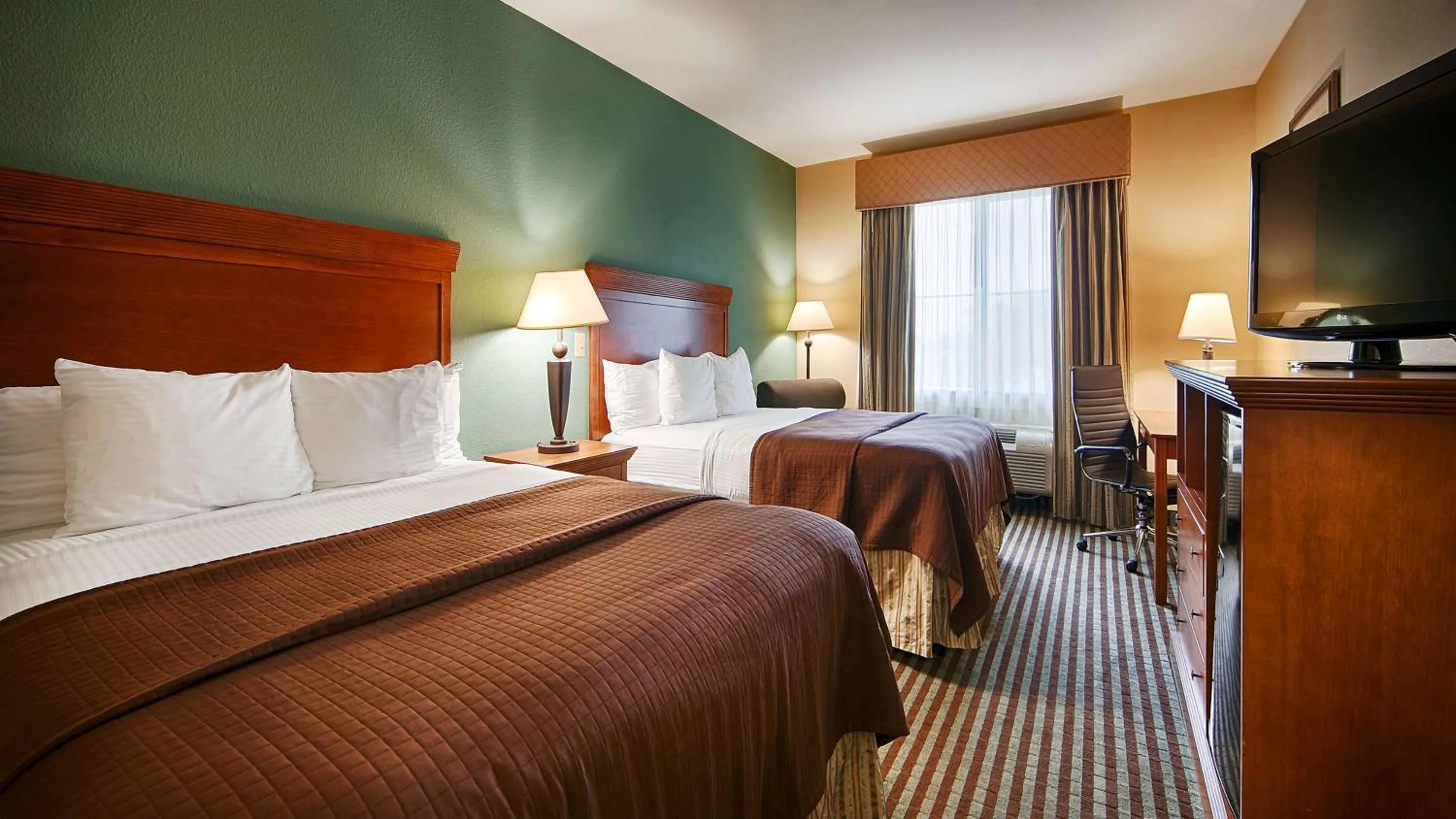 Queen Room with Two Queen Beds - Non-Smoking in Executive Inn & Suites