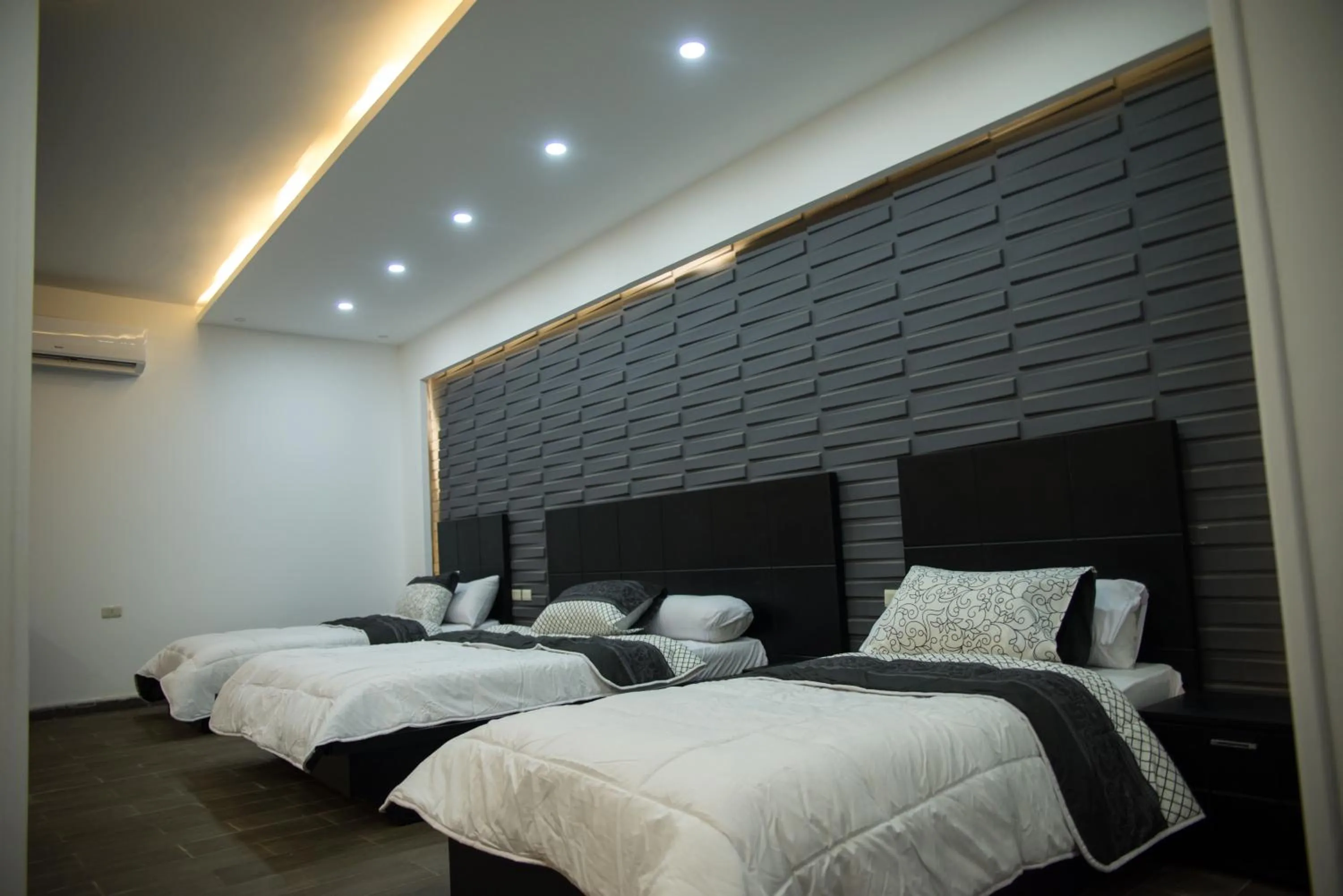 Premium Quadruple Room in Marvel Stone Hotel