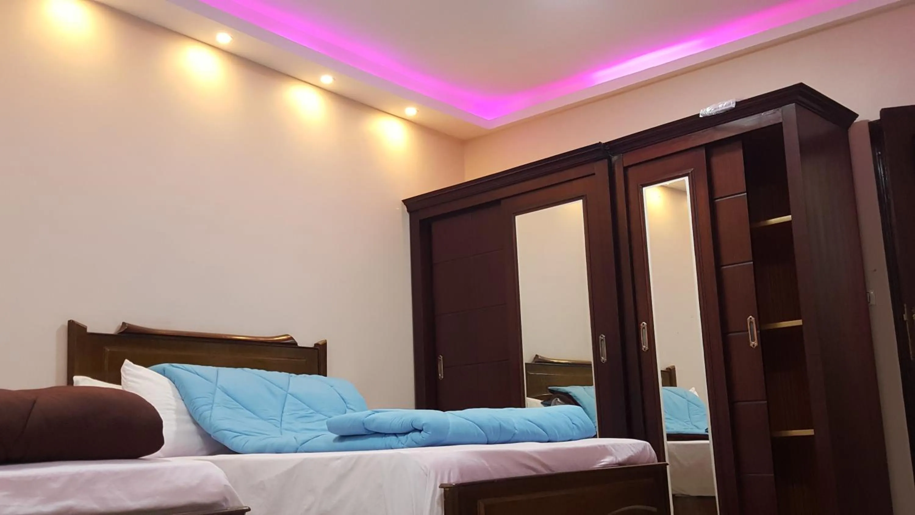 Quadruple Room with Balcony in Royal Pyramids Inn