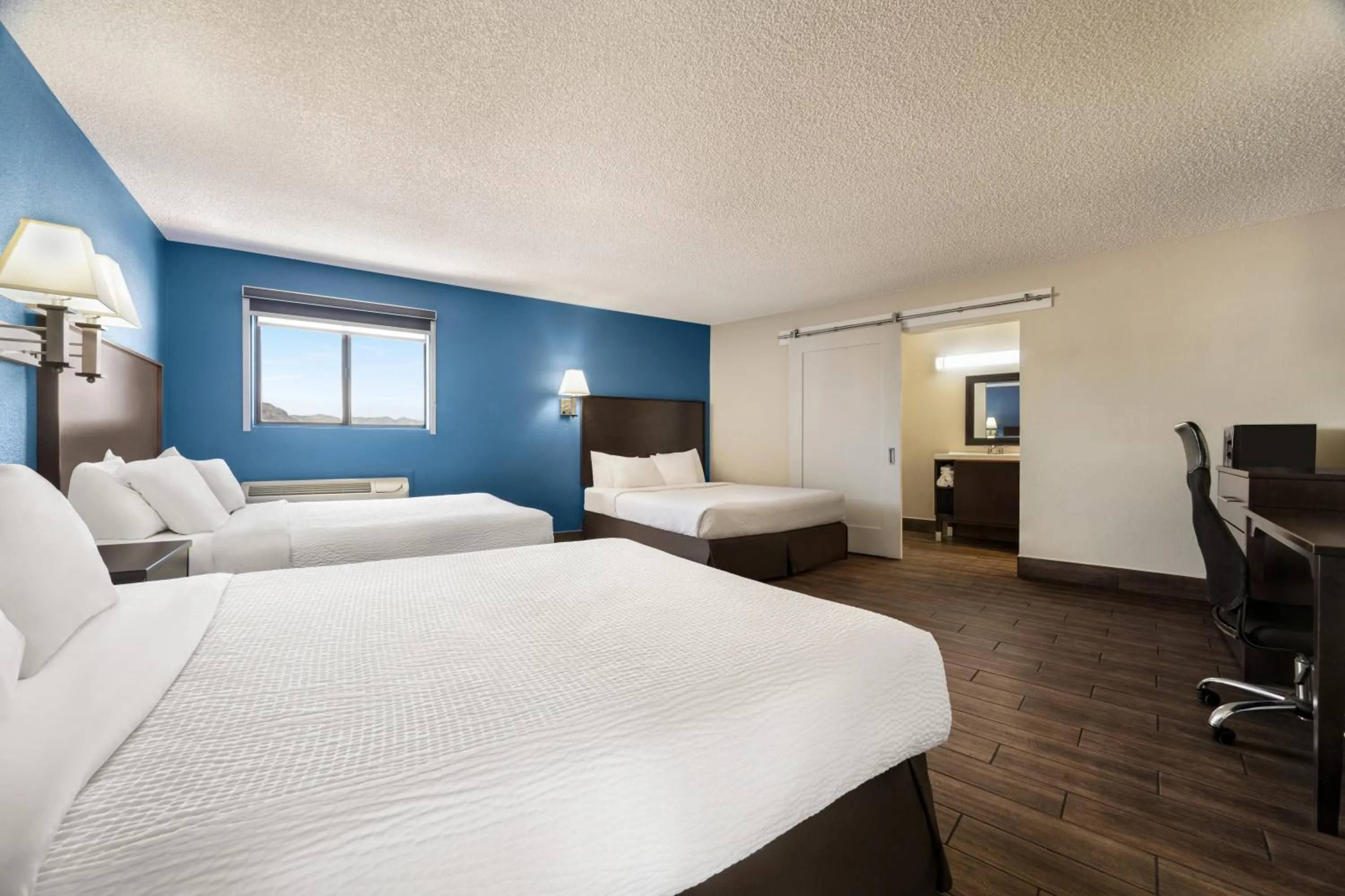 Queen Room with Three Queen Beds and No Elevator Access - Second Floor/Non-Smoking in Baymont by Wyndham Kingman