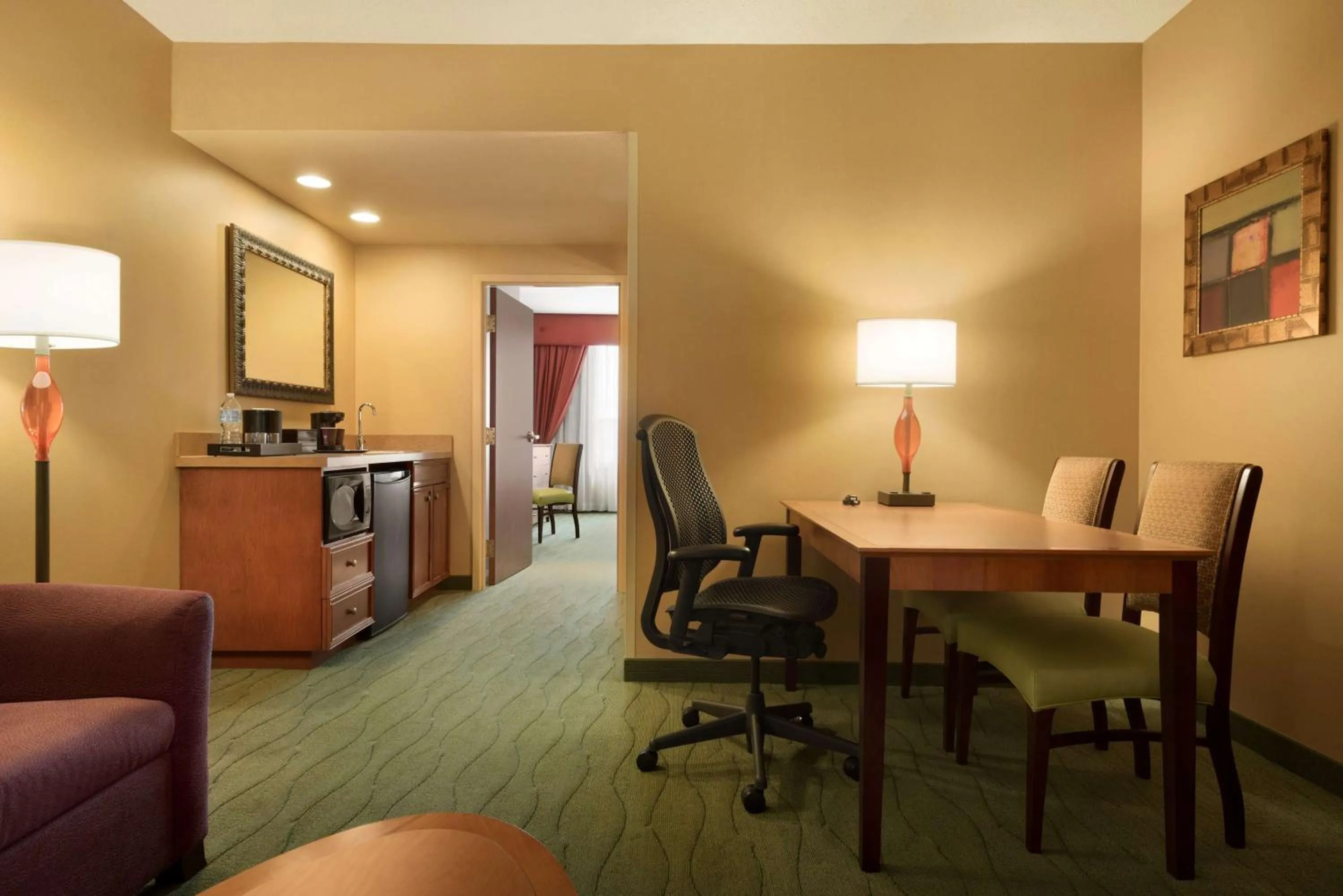 Premium King Corner Wellness Suite with River View in Embassy Suites East Peoria Hotel and Riverfront Conference Center