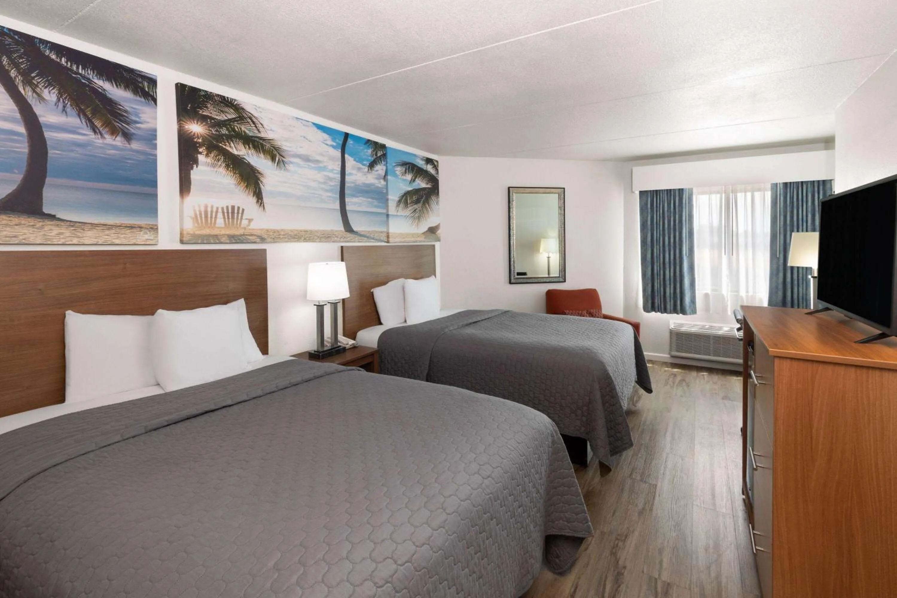 Queen Room with Two Queen Beds - Non-Smoking in Days Inn by Wyndham Biloxi Beach