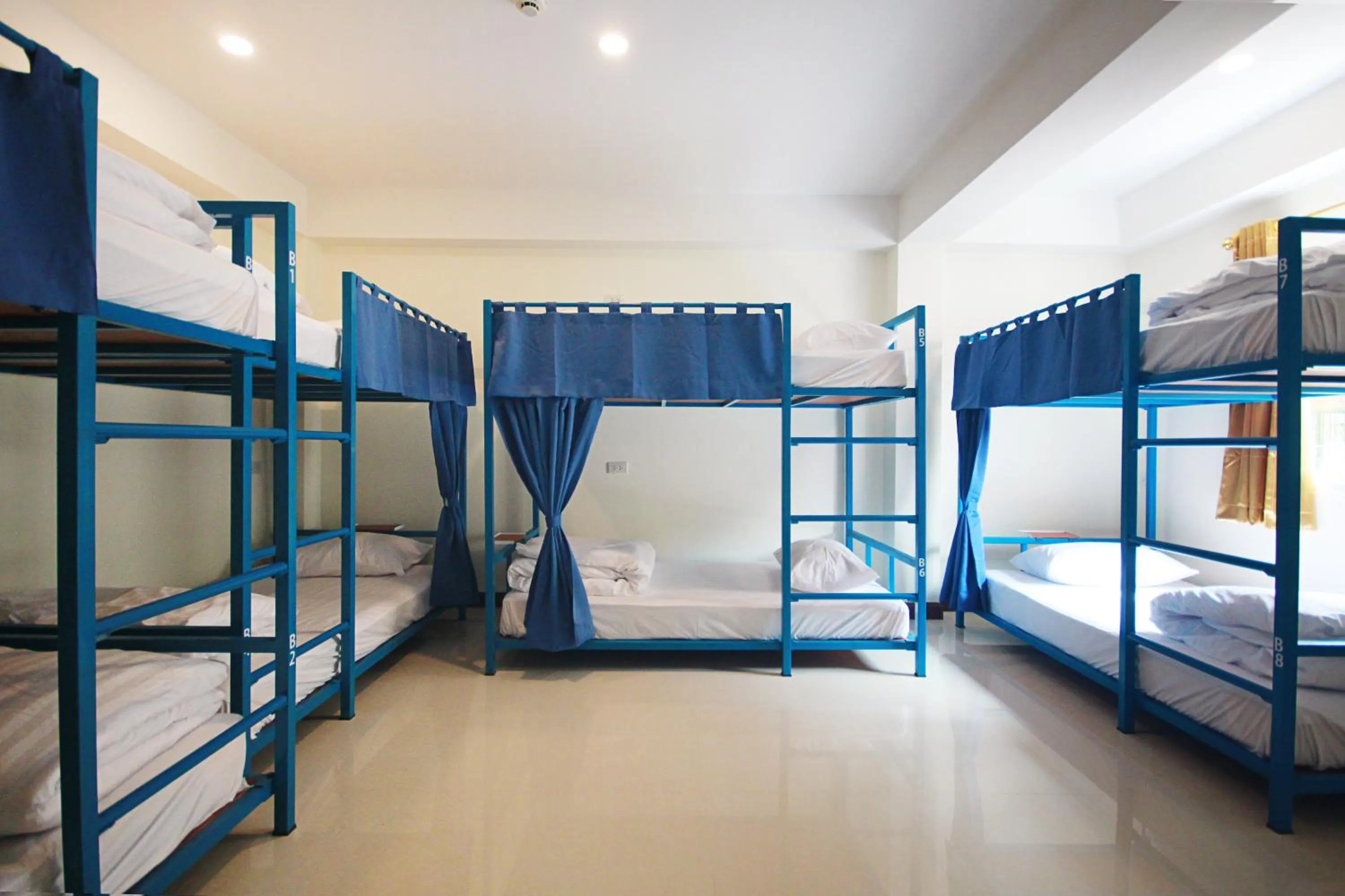 Bed in 8-Bed Mixed Dormitory Room in Happy Hostel