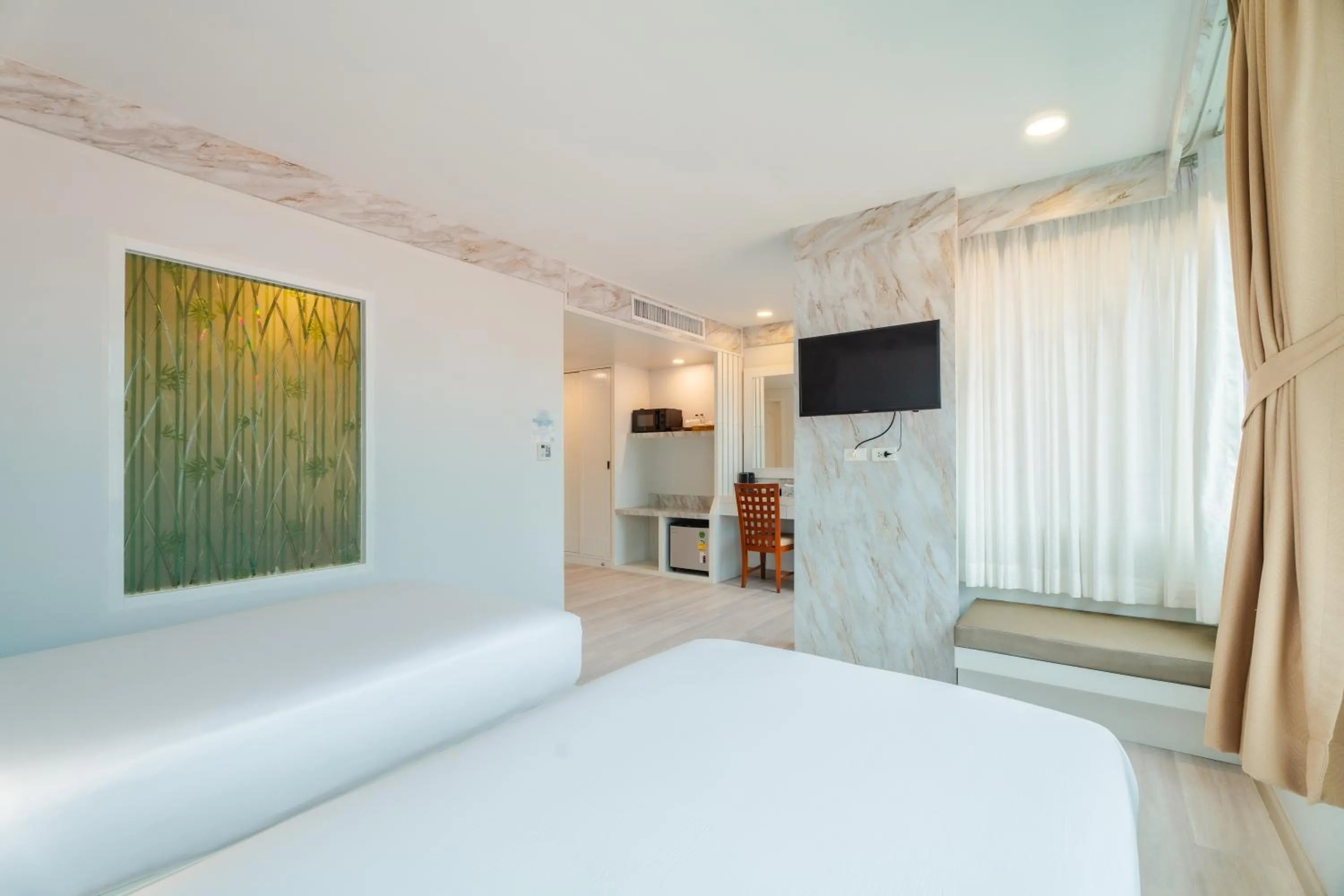 Double or Twin Room with Partial Sea View in Baumancasa Beach Resort