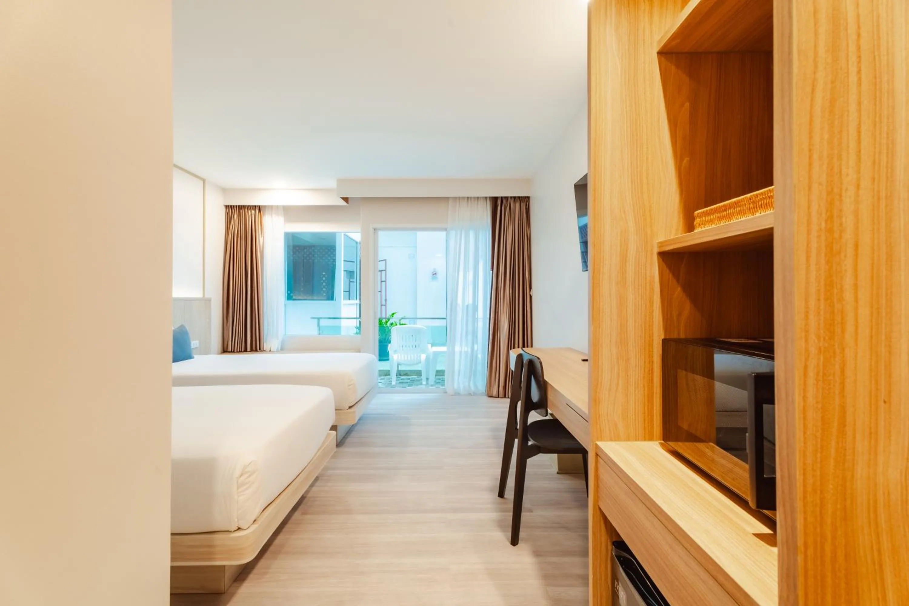 Deluxe Double or Twin Room with Pool Access in Baumancasa Beach Resort