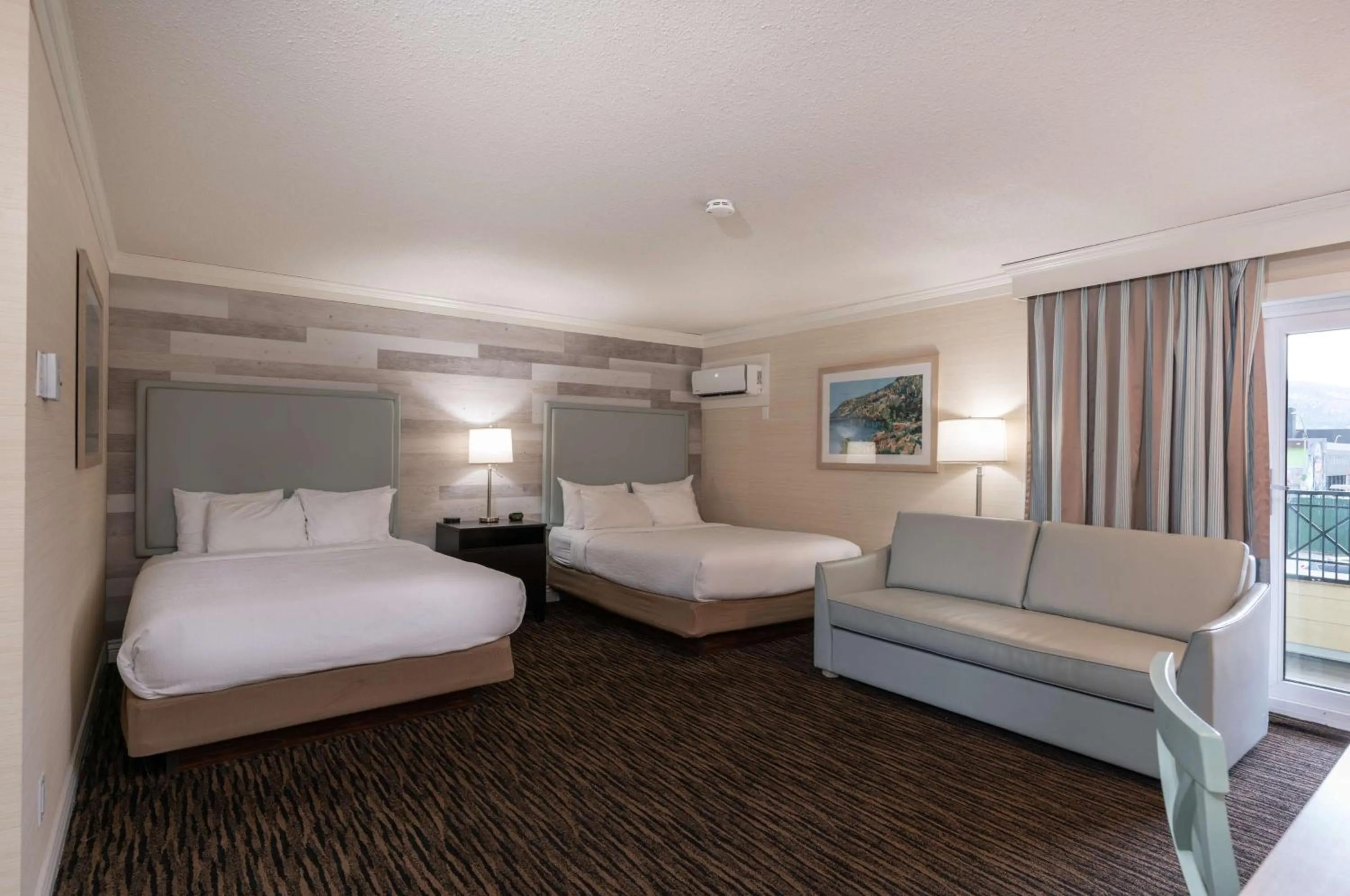 Queen Room with Two Queen Beds with Sofa Bed in Prestige Beach House, WorldHotels Crafted