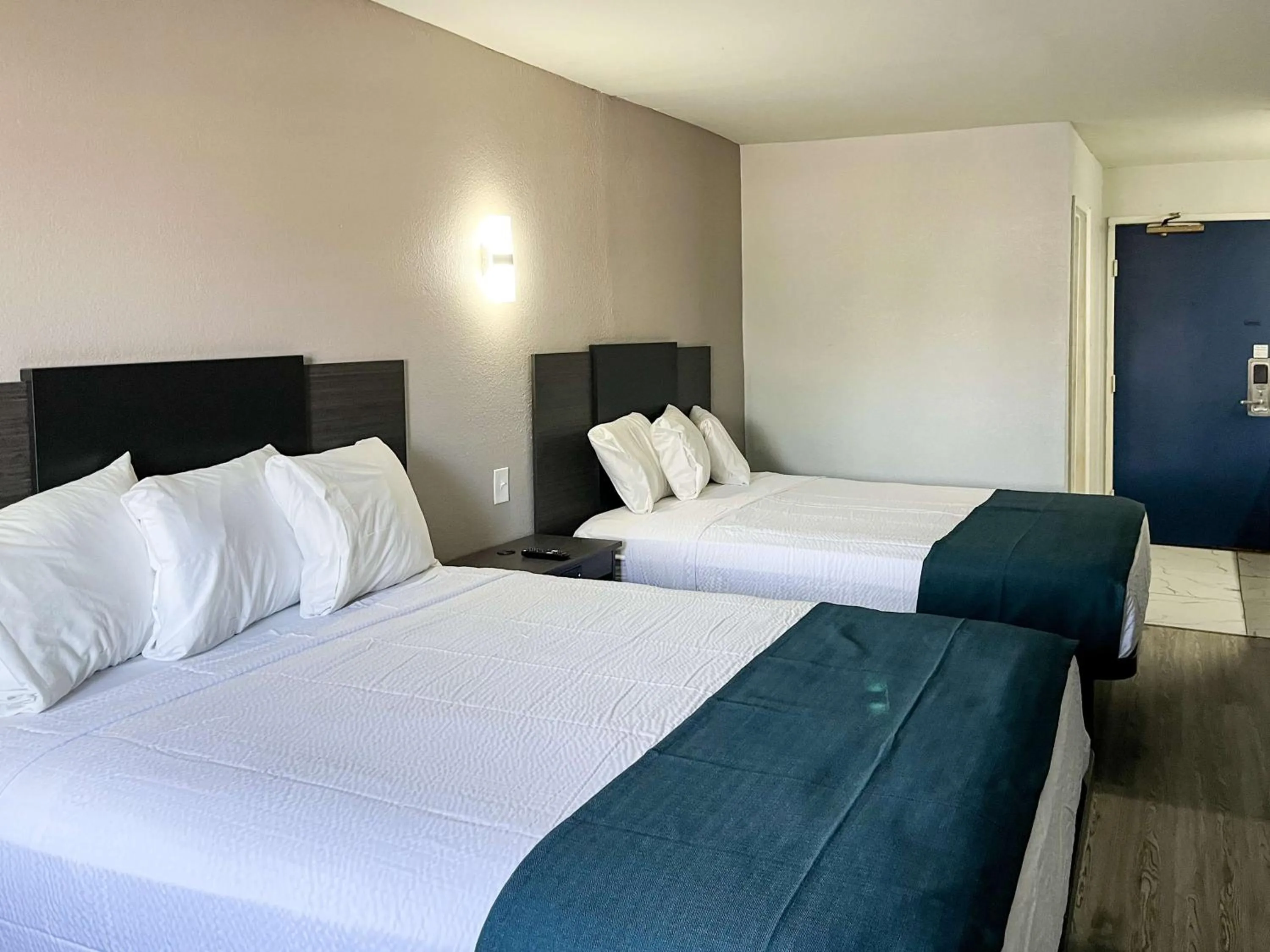 Queen Room with Two Queen Beds - Non-Smoking in Studio 6 Suites Delano, CA